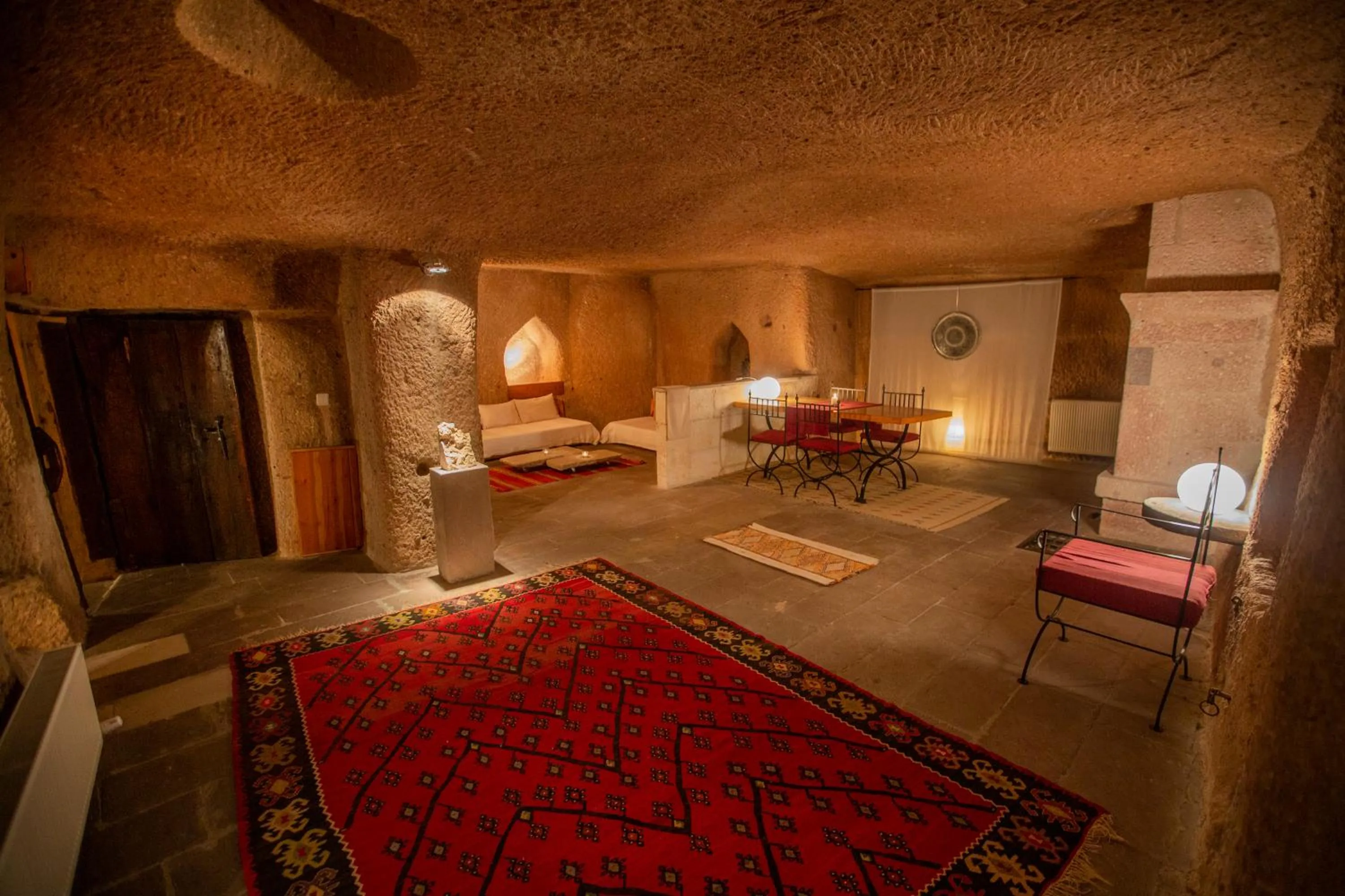 Living room, Bed in Asmalı Cave House