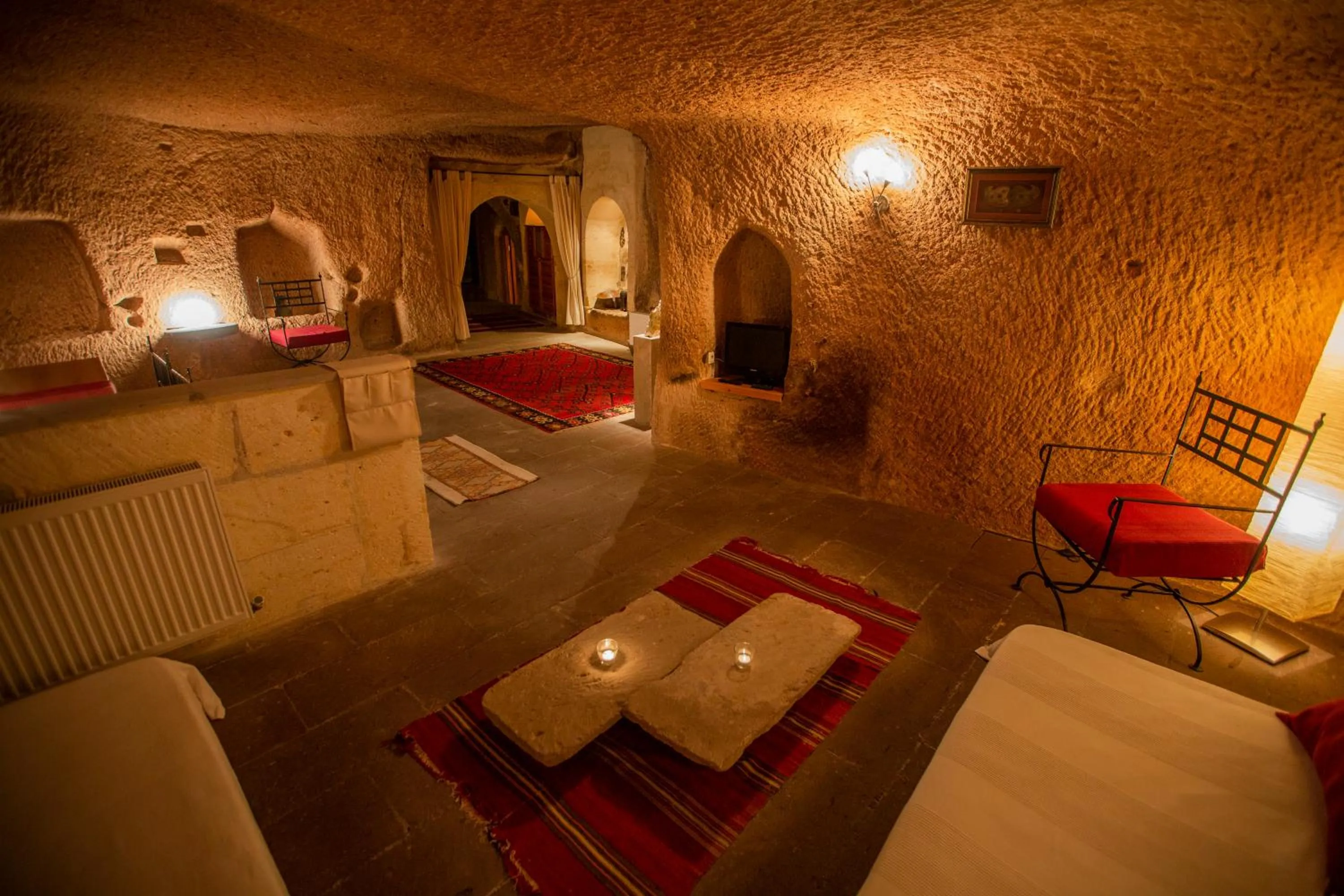Living room, Bed in Asmalı Cave House