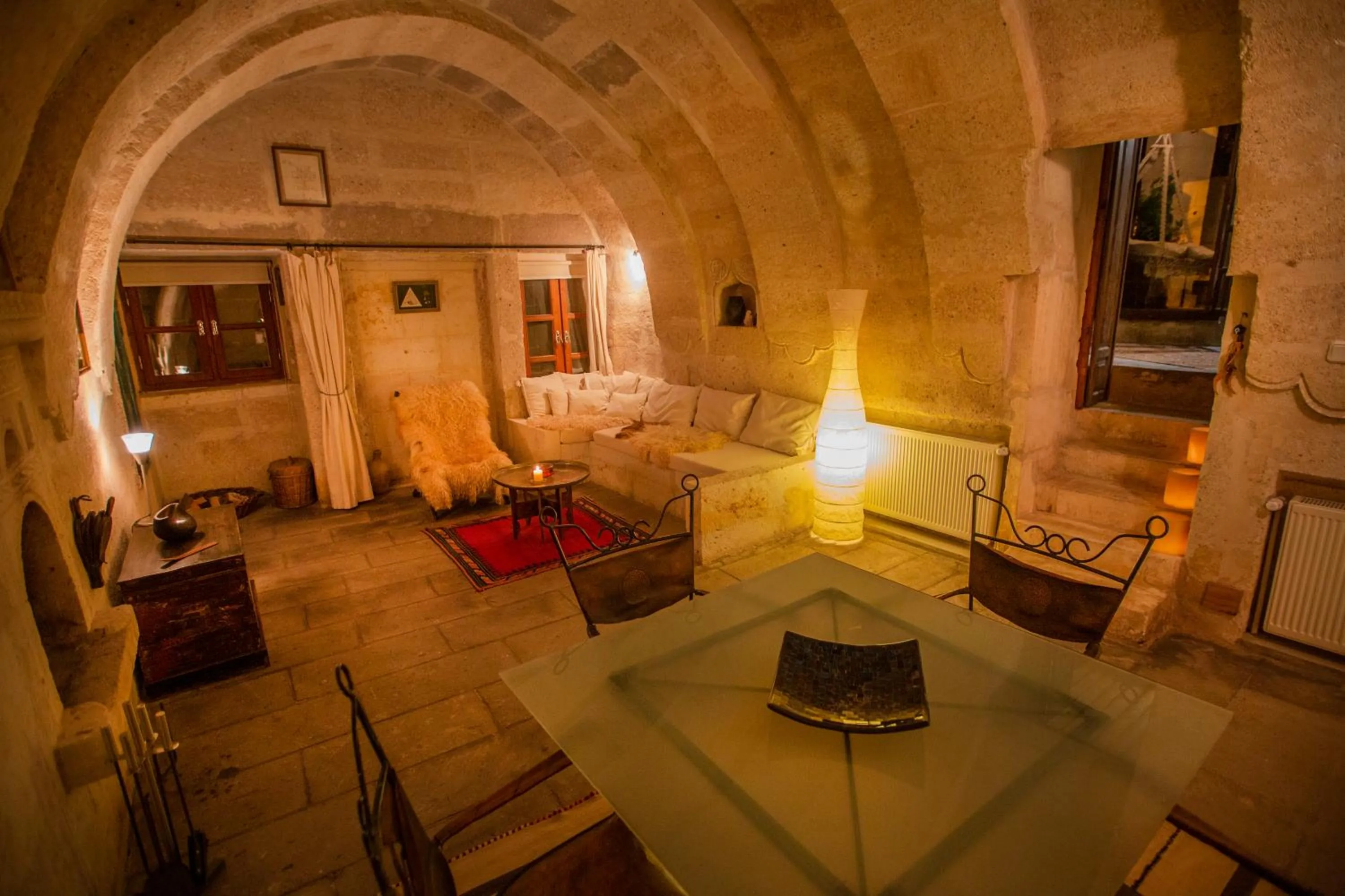 Living room, Bed in Asmalı Cave House
