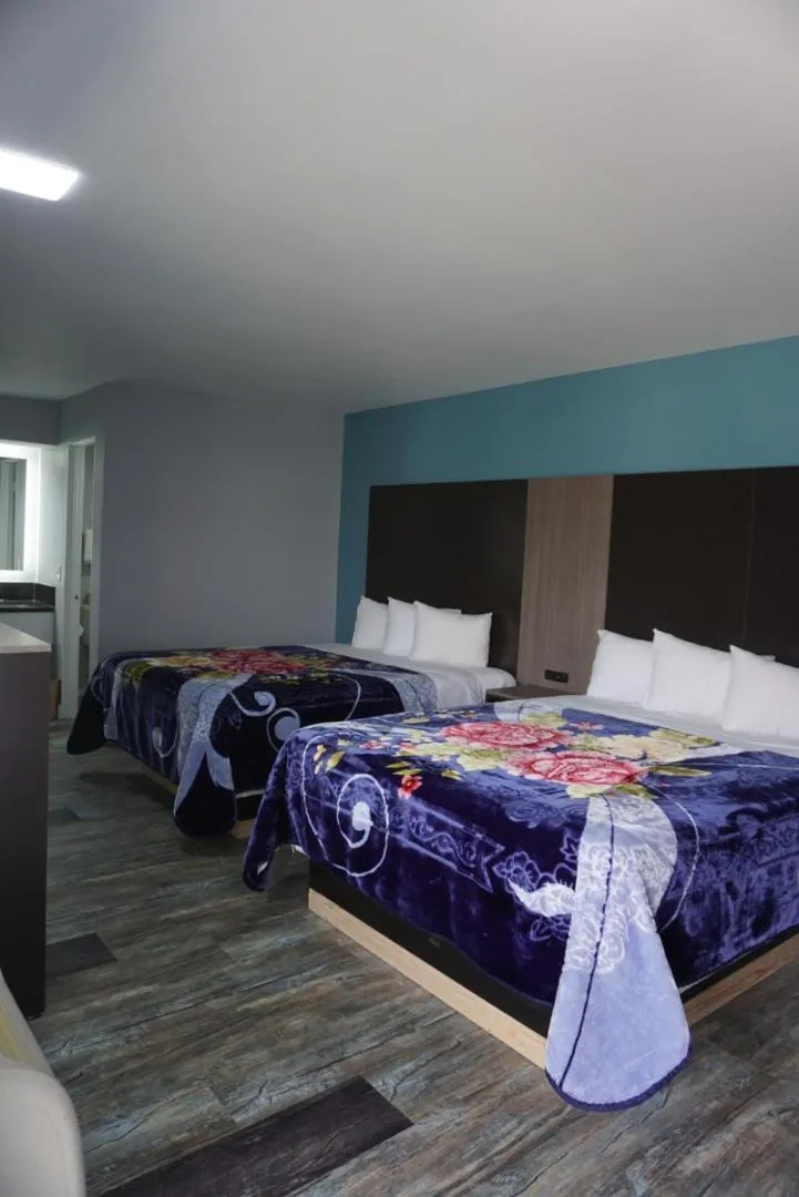 Bed in Thunderbird Motel