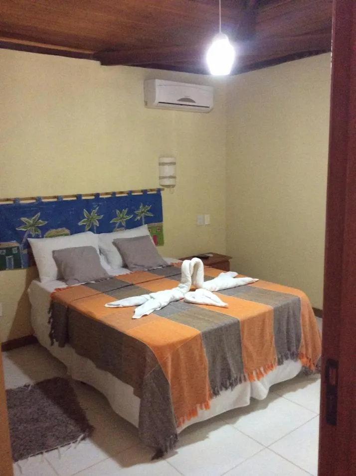 Bed in Pousada Araçás Village