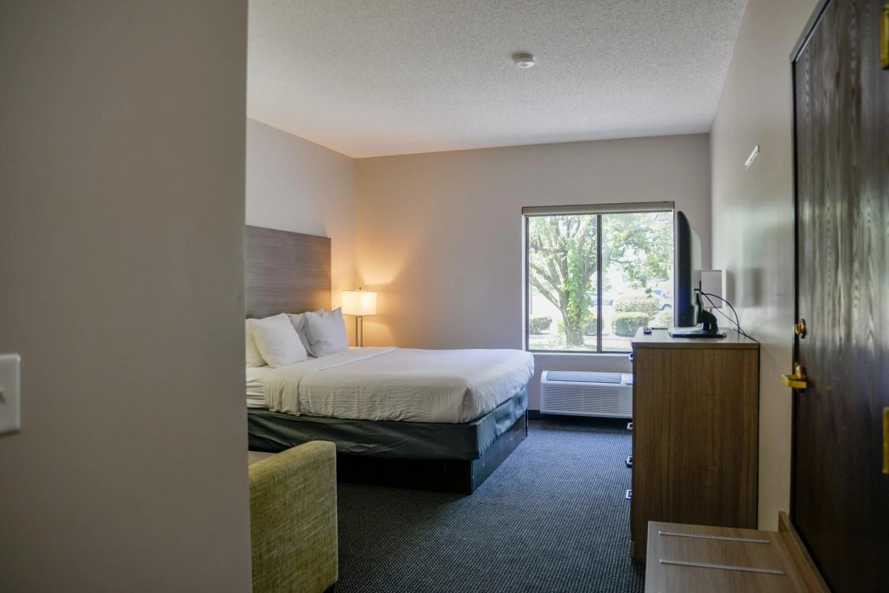 Photo of the whole room, Bed in Baymont by Wyndham O'Fallon St. Louis Area