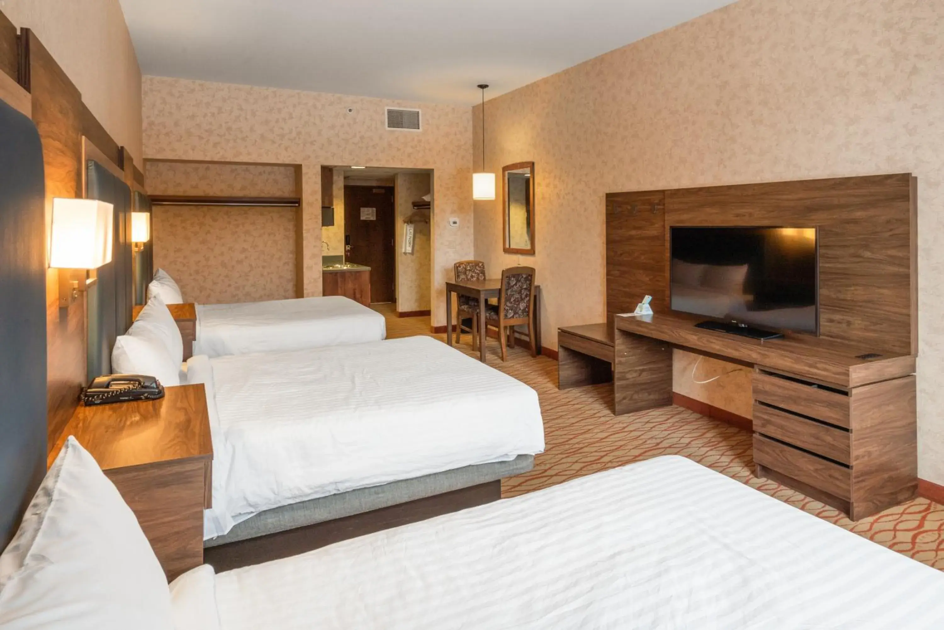 Three Queen Beds - Mountain View in The Lodge at Big Sky Three Queen Beds - Mountain View in The Lodge at Big Sky