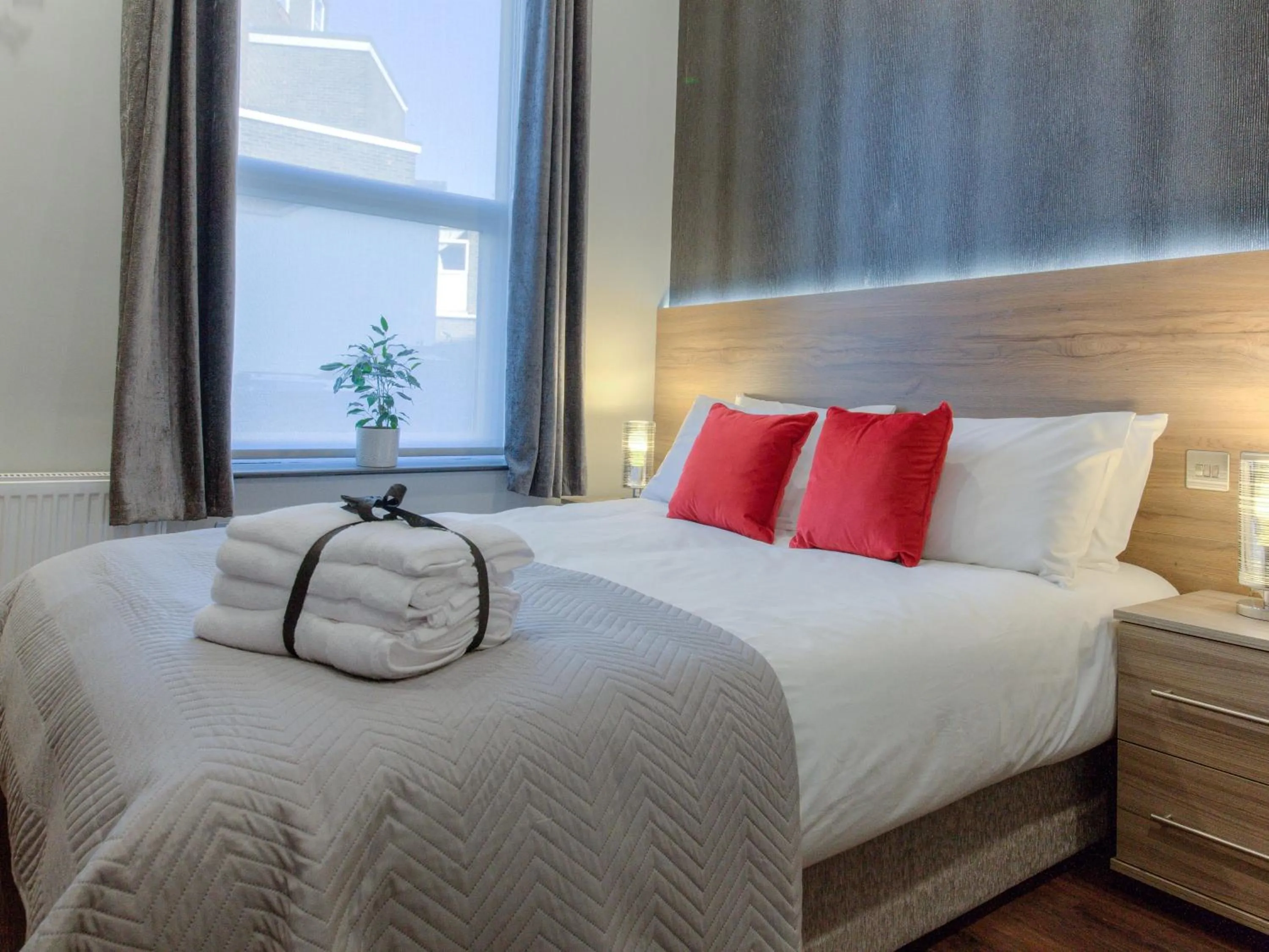 Bedroom in Remaotel The Bromley Apartments