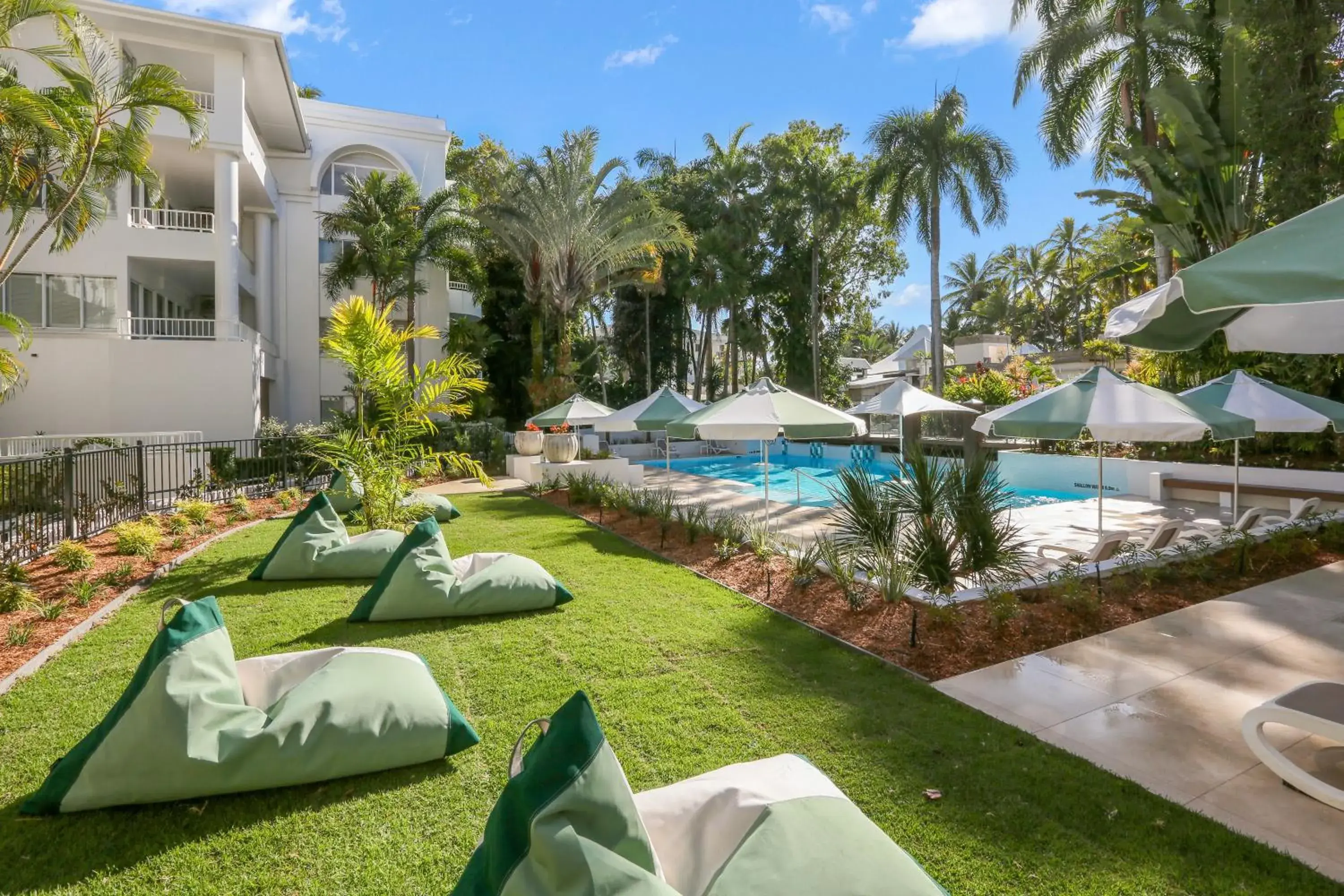 Swimming pool in Alamanda Palm Cove by Lancemore Swimming pool in Alamanda Palm Cove by Lancemore