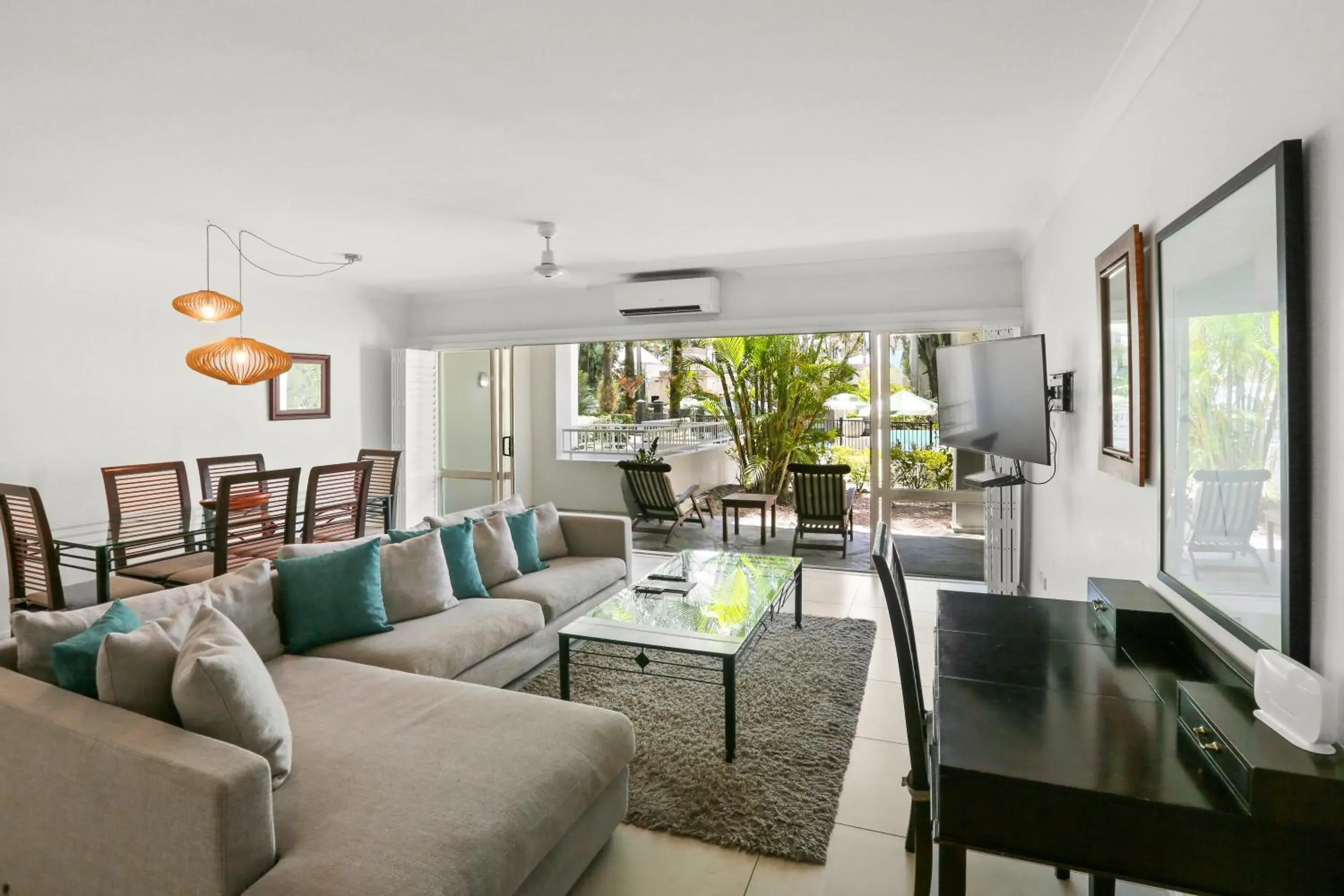 Living room in Alamanda Palm Cove by Lancemore Living room in Alamanda Palm Cove by Lancemore