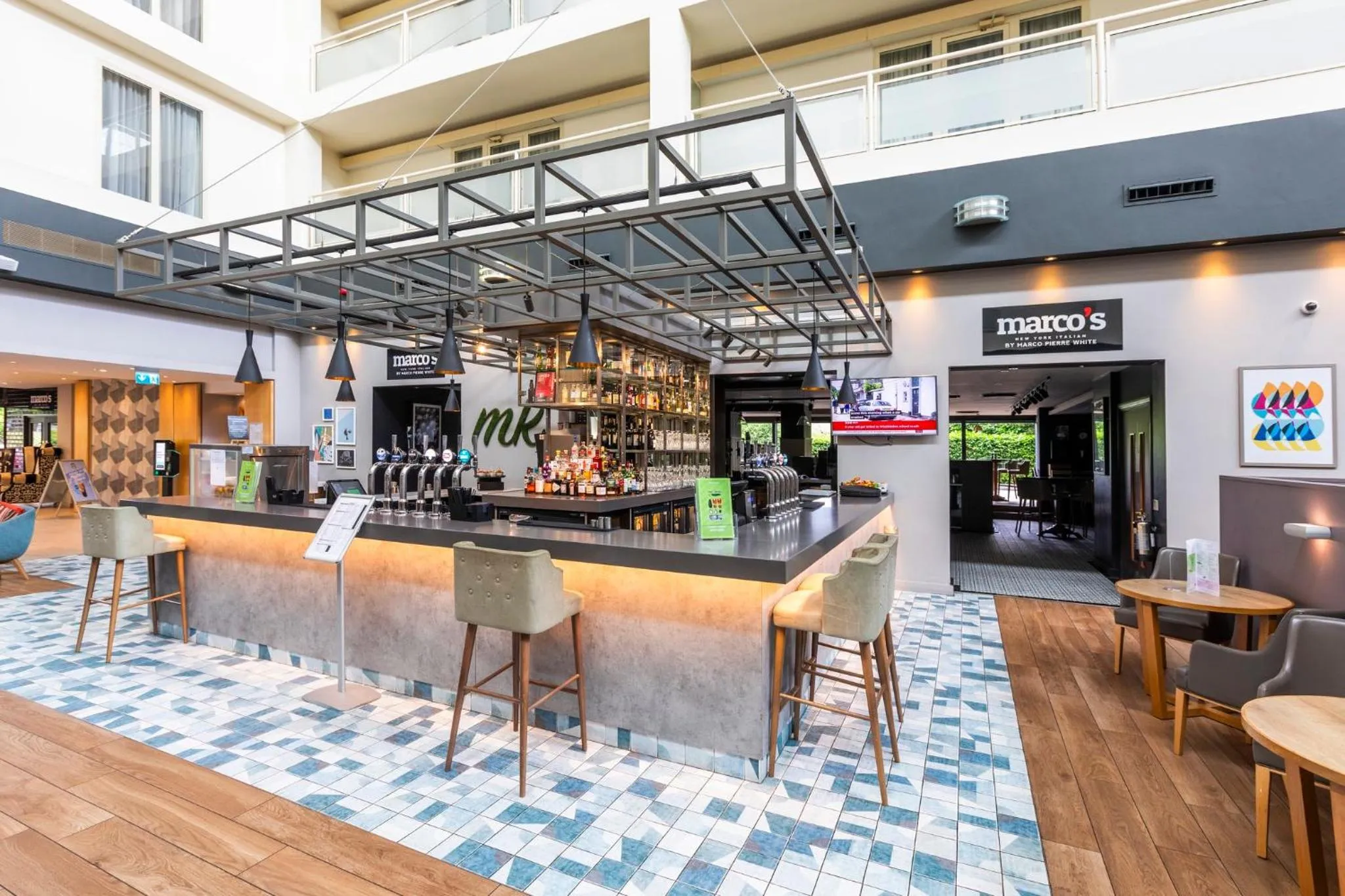 Lounge or bar in Holiday Inn Milton Keynes Central by IHG