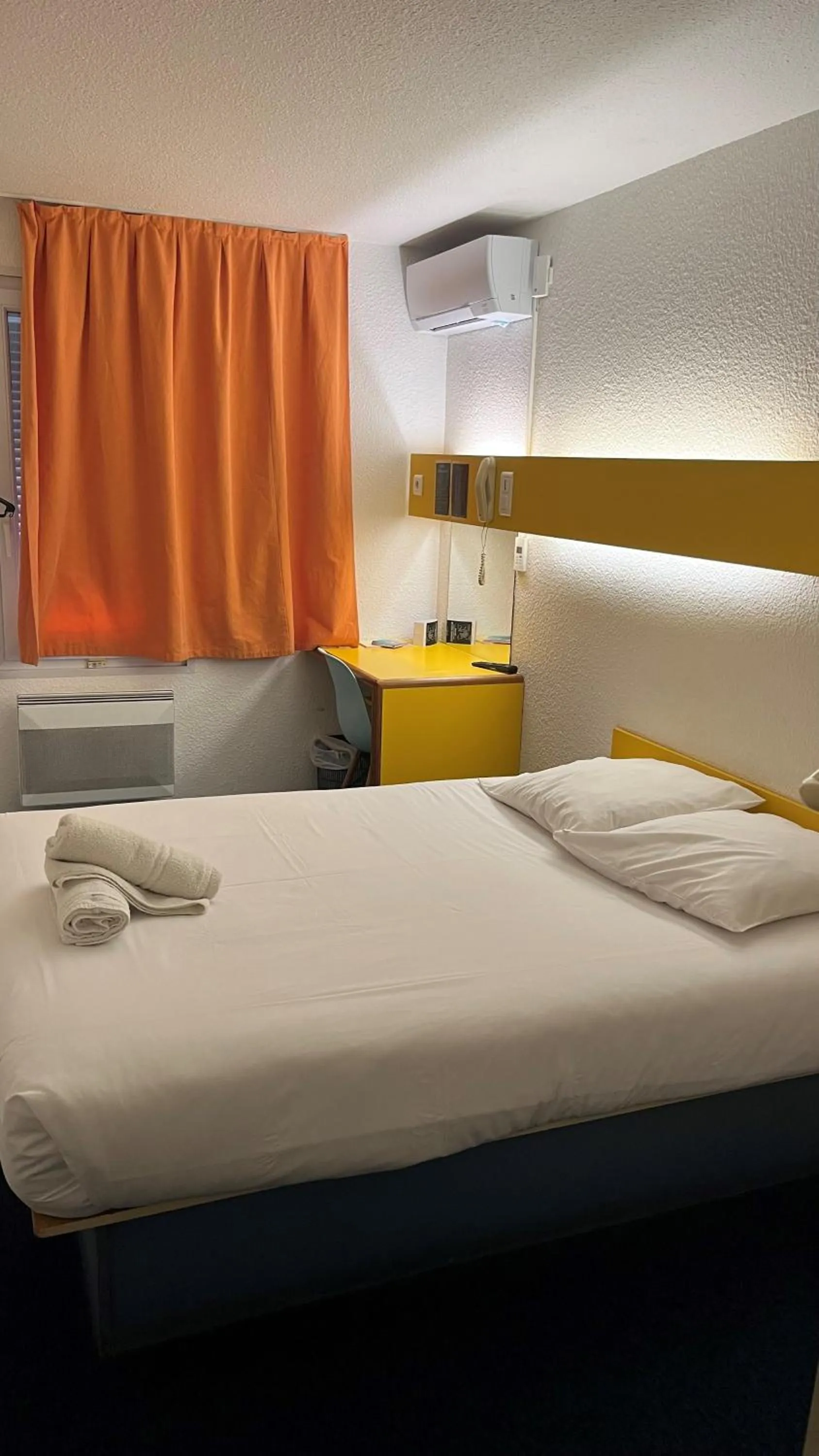 Bed in Quick Palace Anglet