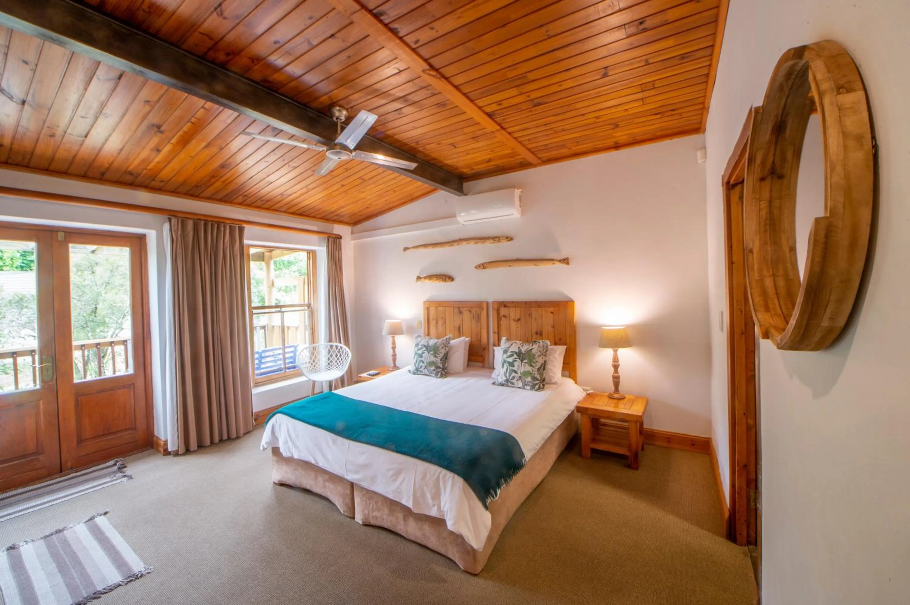 Bed in At the Woods Guest House