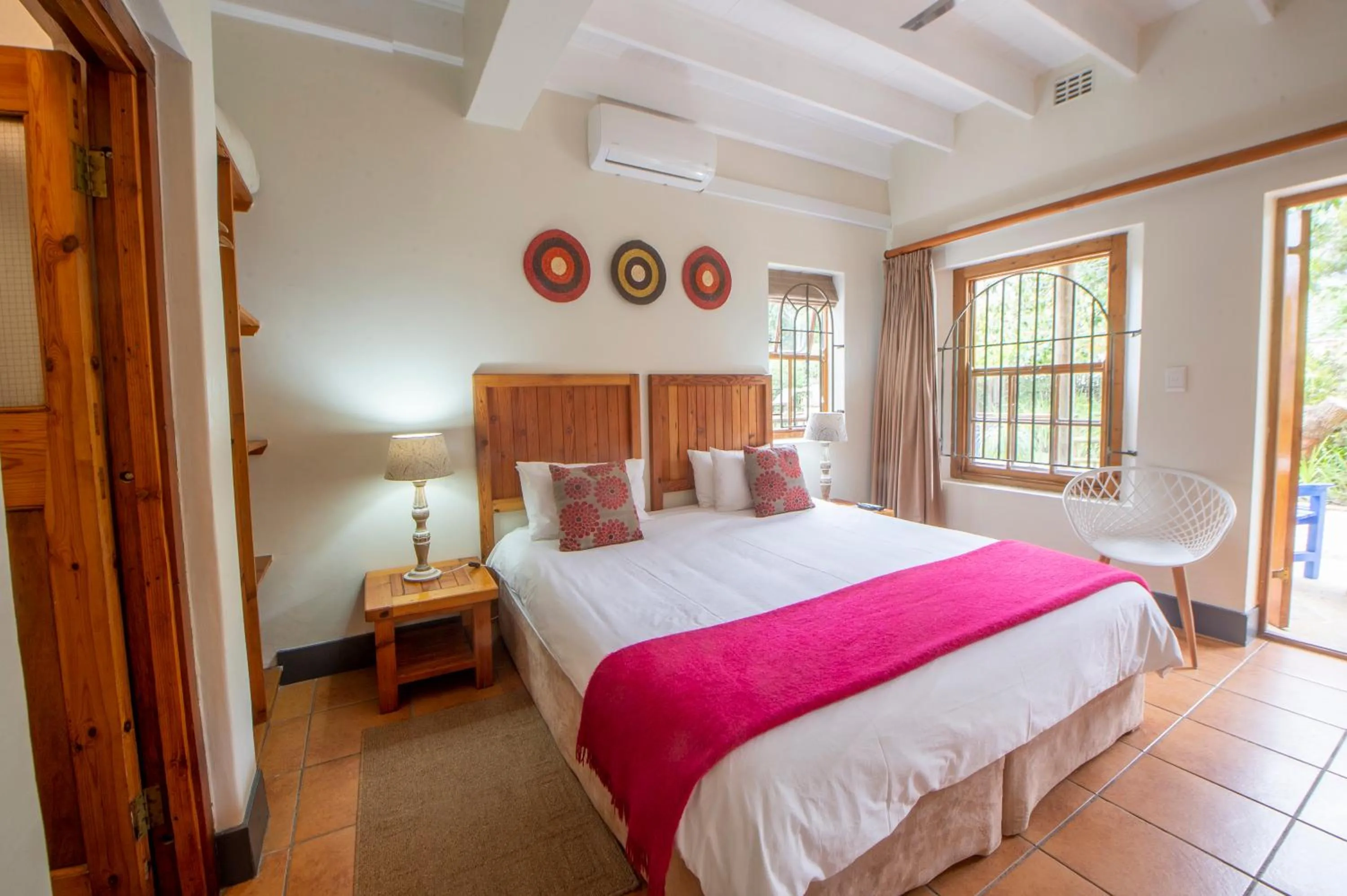 Bed in At the Woods Guest House