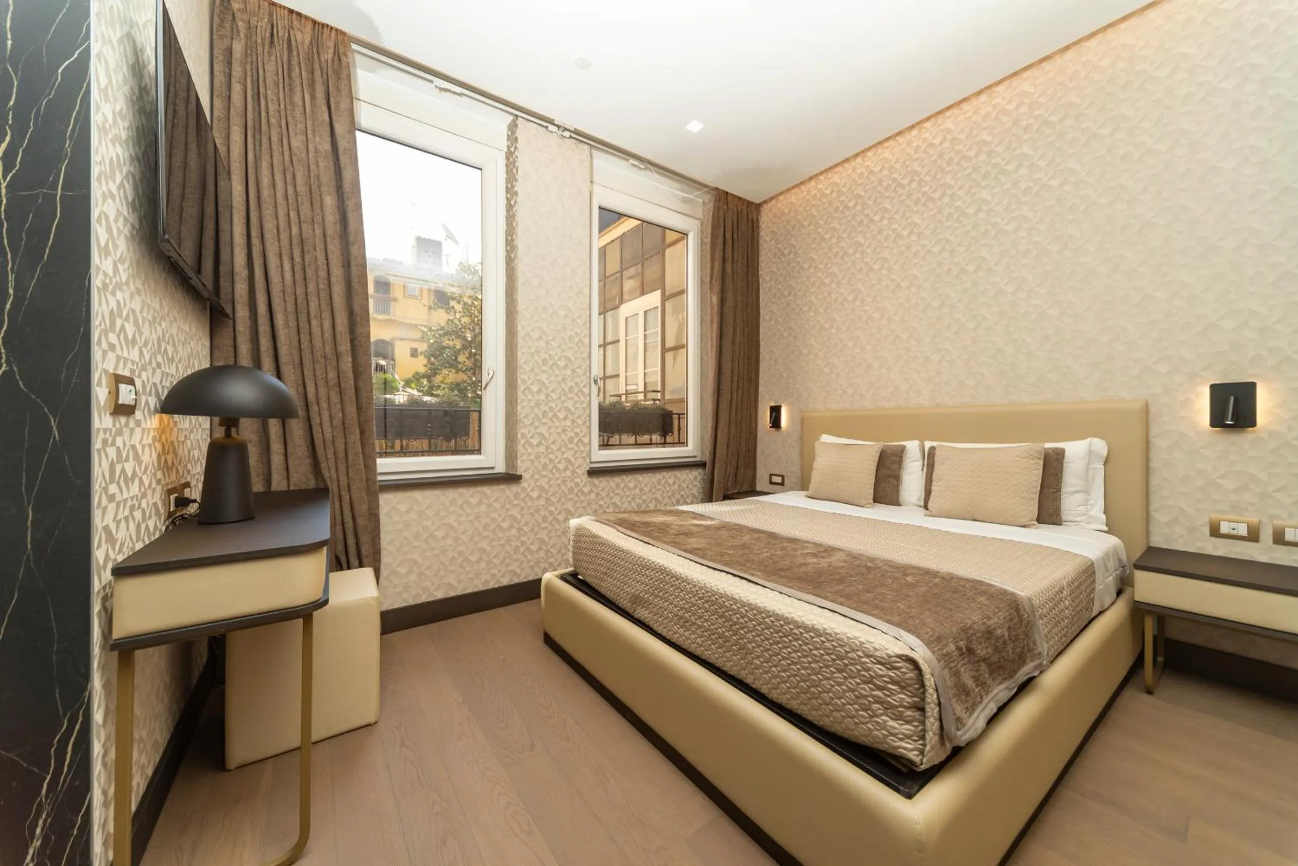 Bed in San Carlo Suite