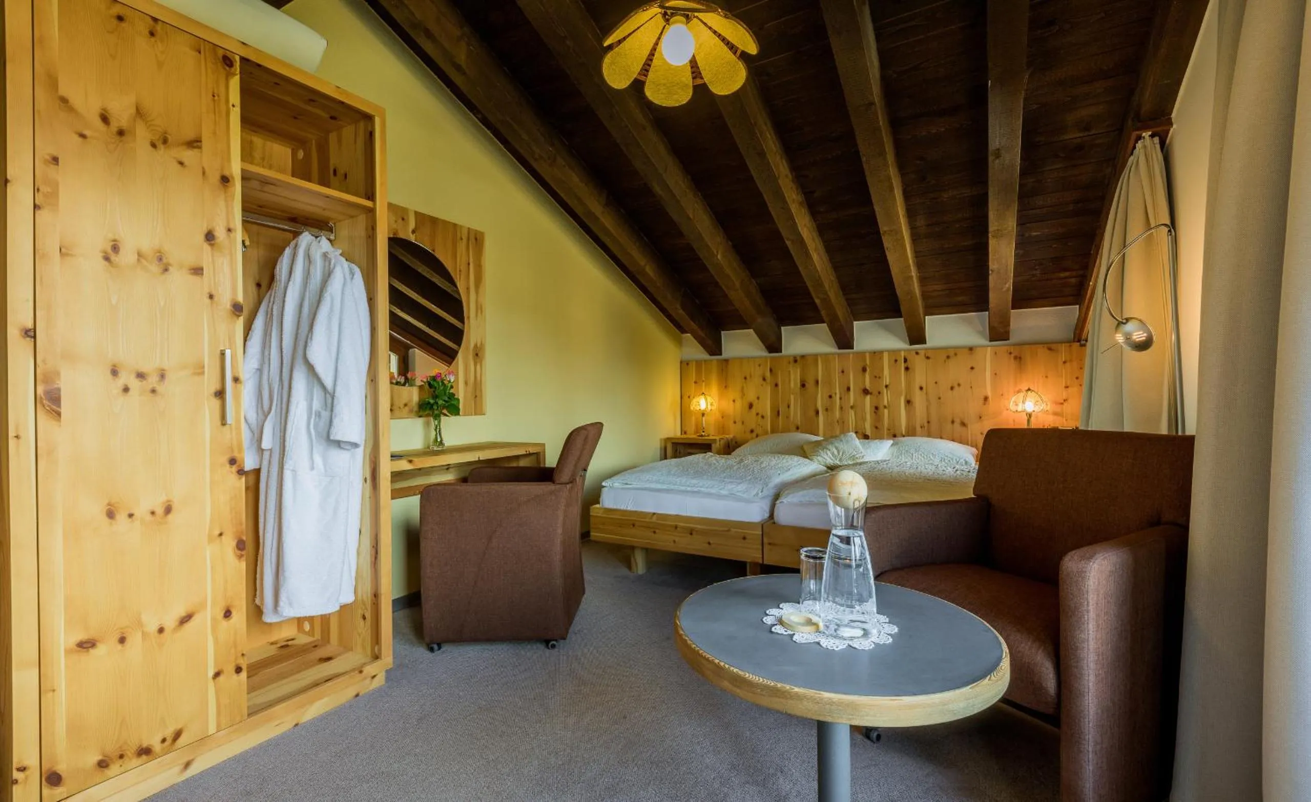 Photo of the whole room, Bed in Sporthotel Walliserhof