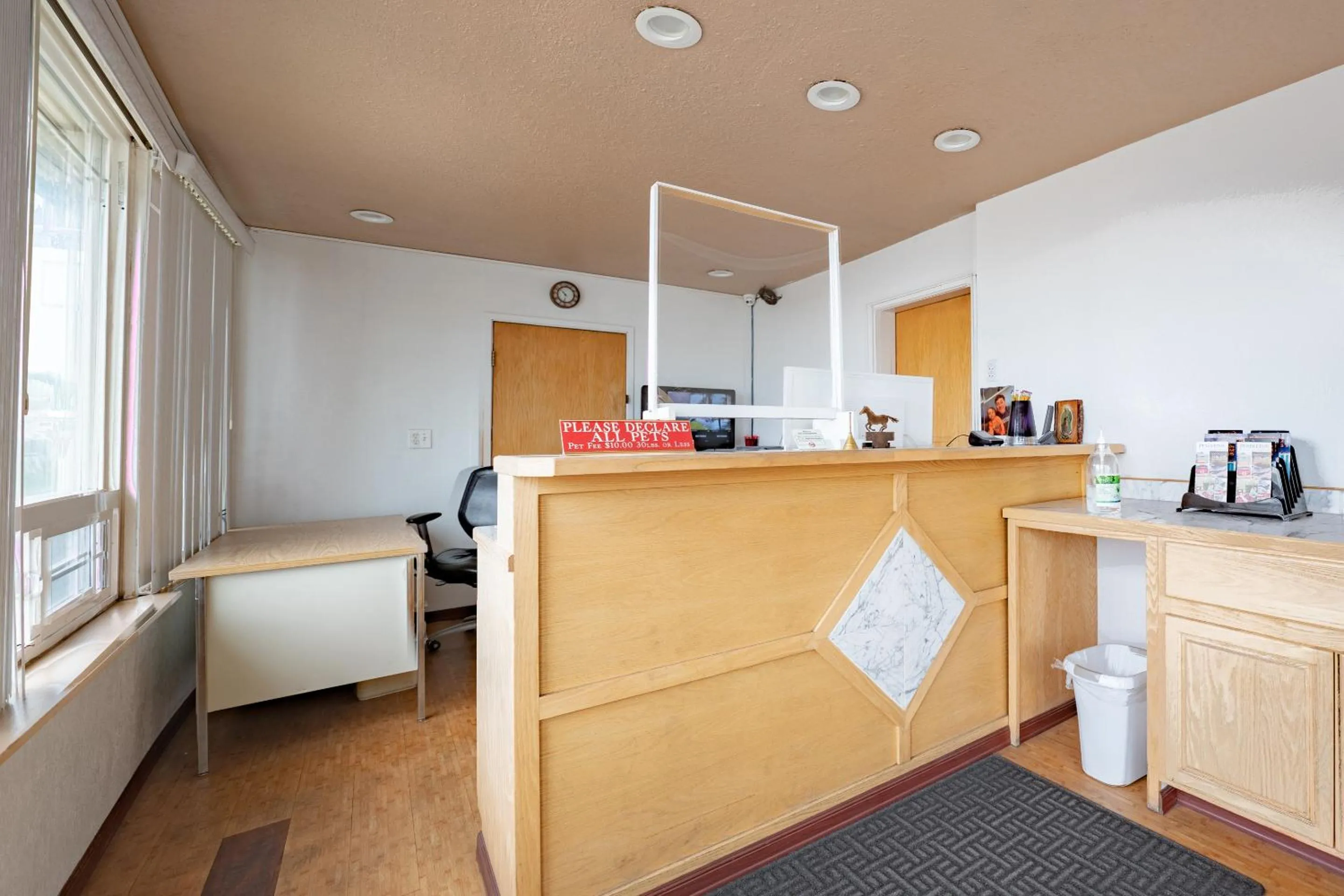 Lobby or reception in Budget Inn Madras by OYO