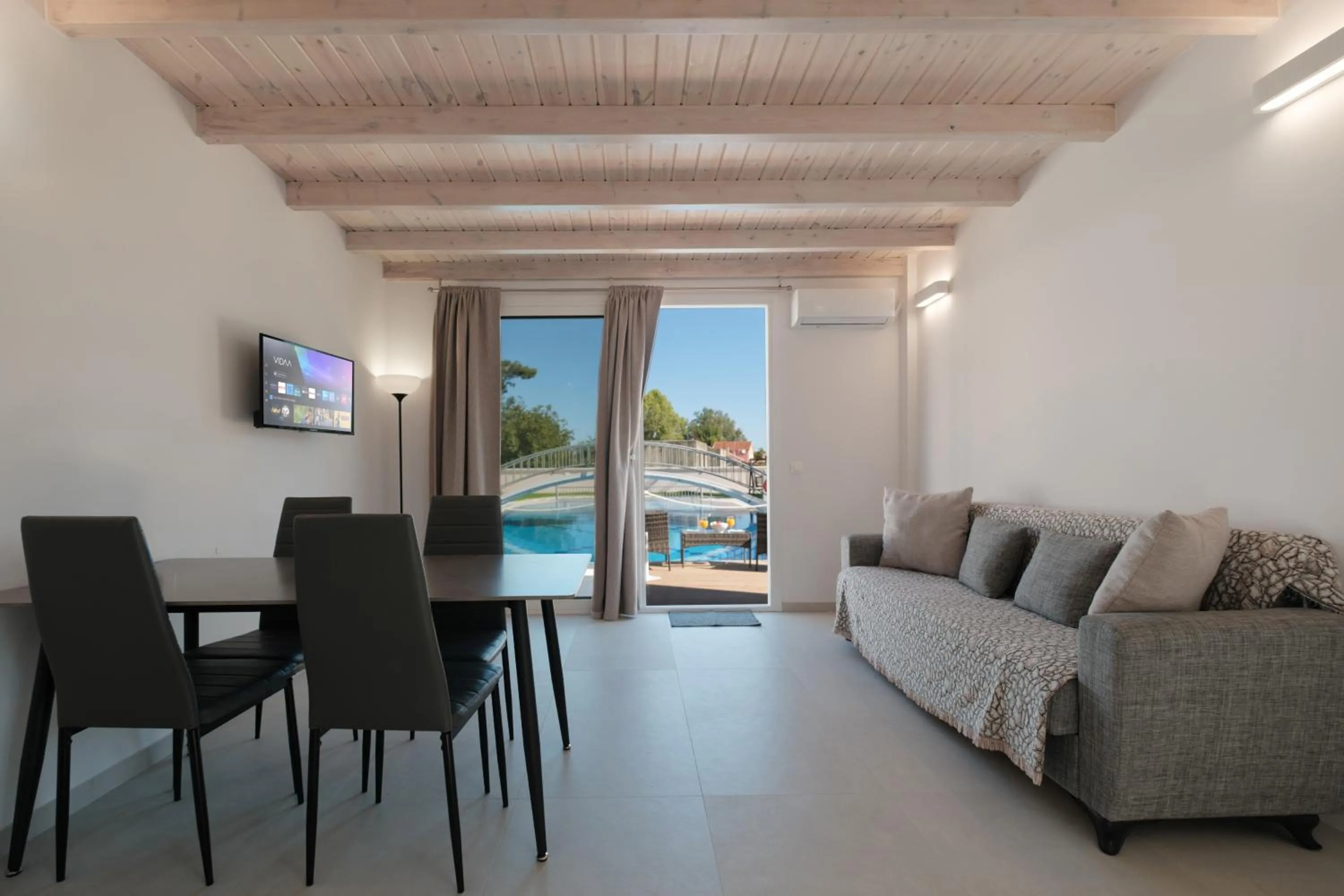 Communal lounge/ TV room in Dimitris Apartments