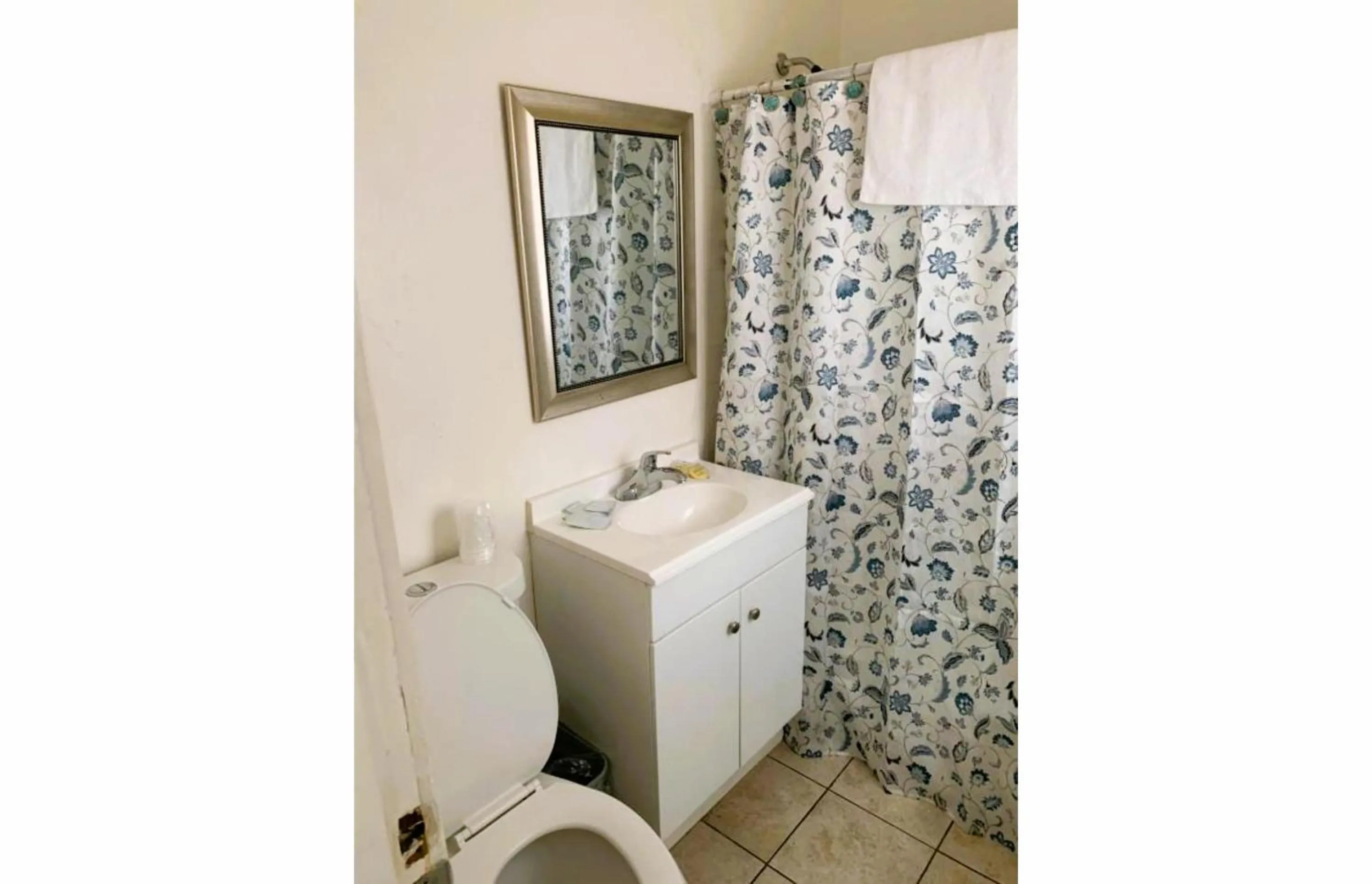 Bathroom in Royal Gateway Motel by OYO