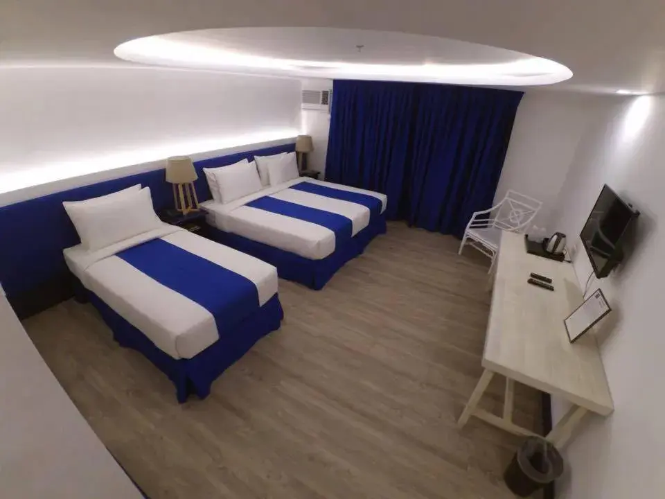 TV and multimedia, Bed in GT Hotel Jaro TV and multimedia, Bed in GT Hotel Jaro