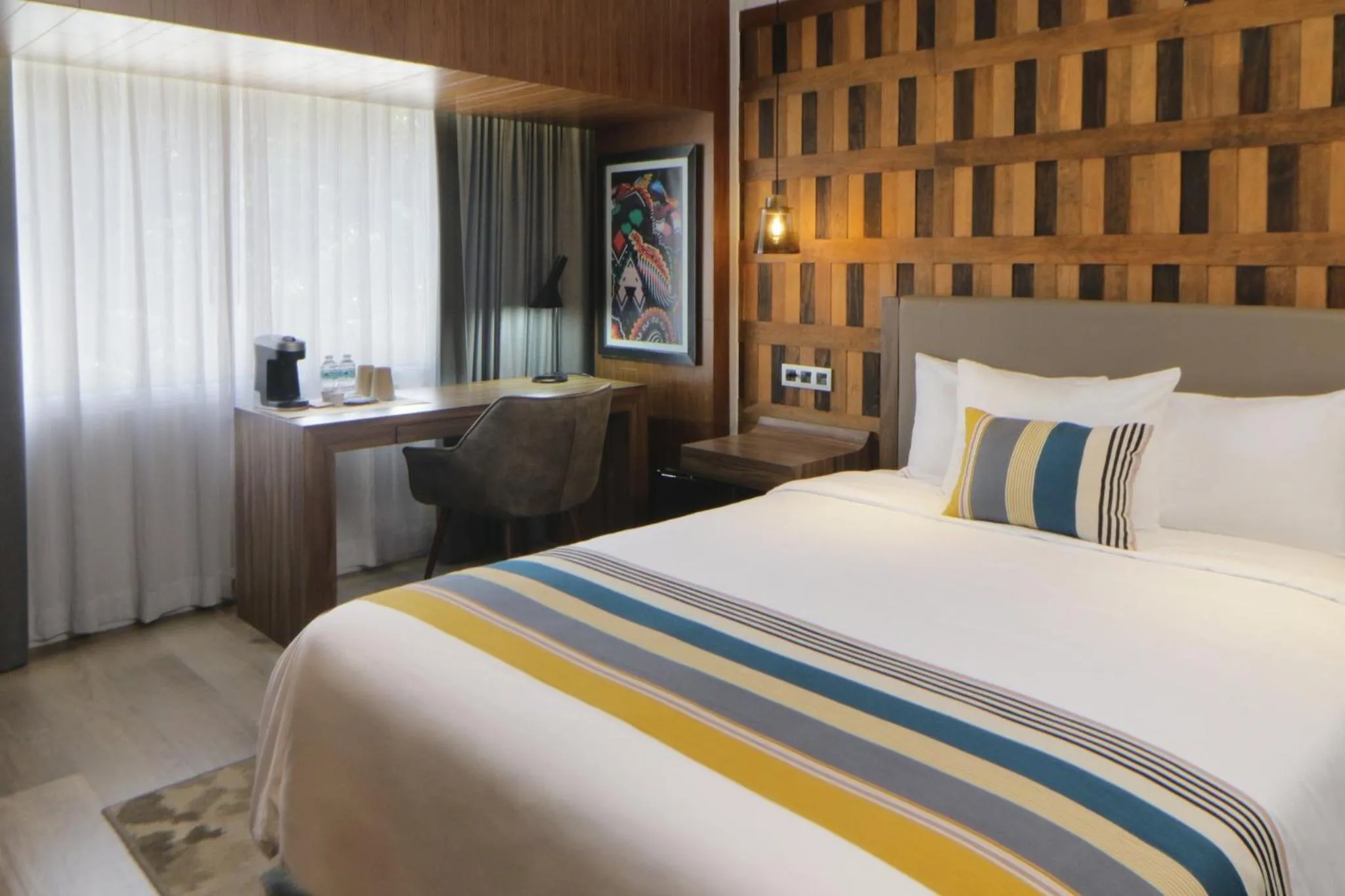 Photo of the whole room, Bed in Hotel Indigo Guadalajara Expo by IHG