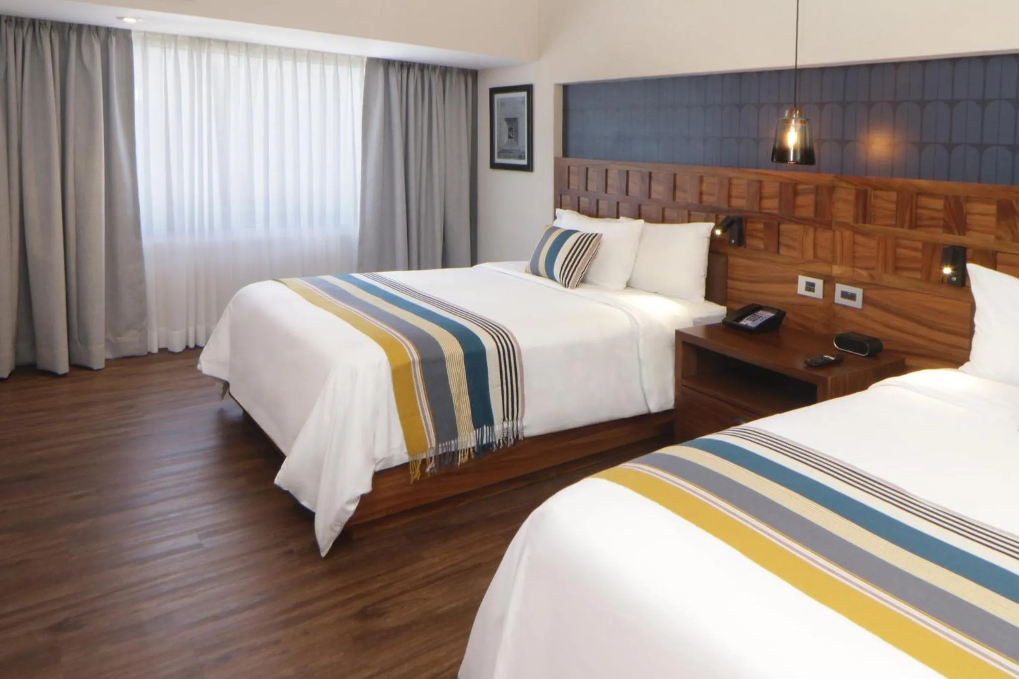 Photo of the whole room, Bed in Hotel Indigo Guadalajara Expo by IHG