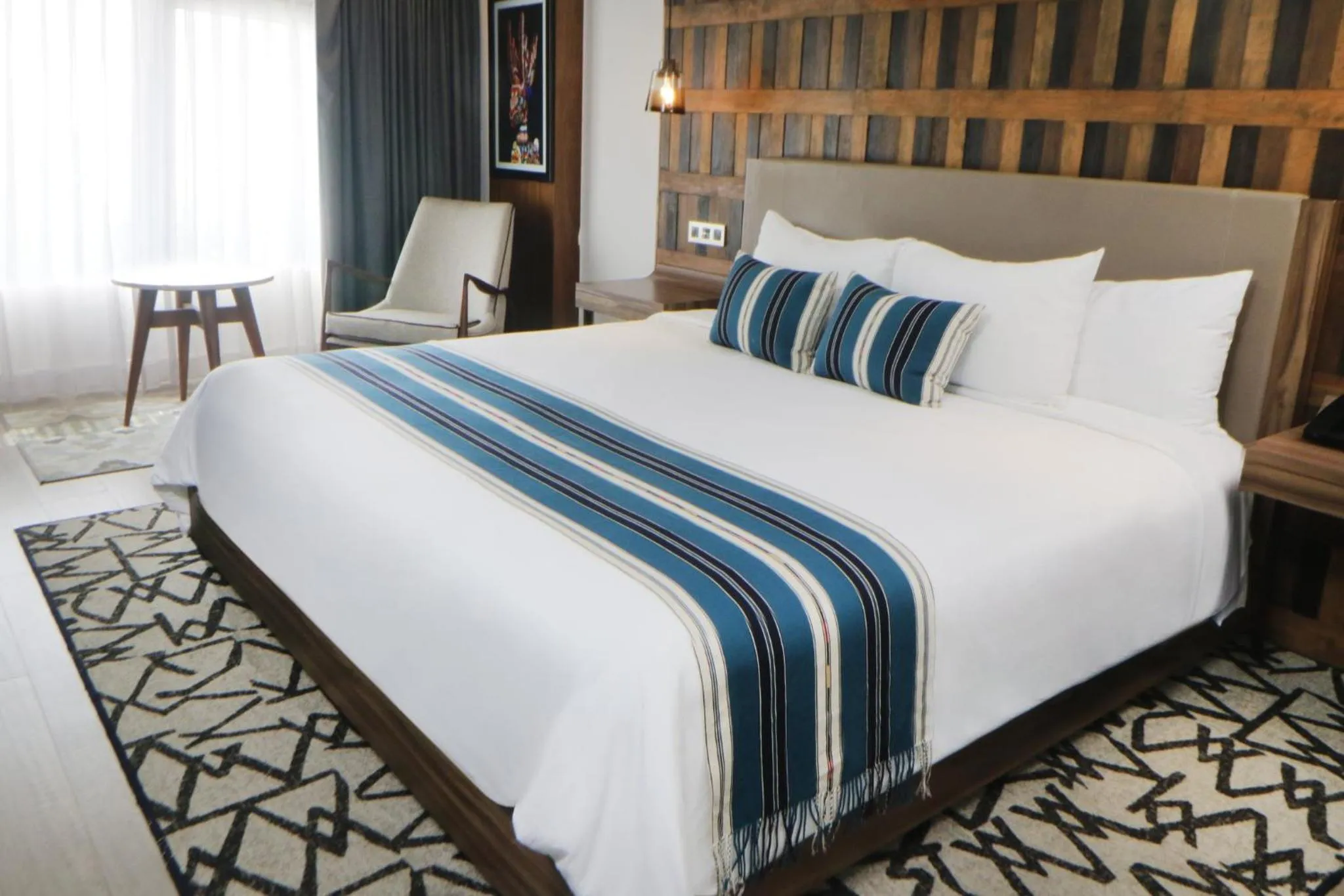 Photo of the whole room, Bed in Hotel Indigo Guadalajara Expo by IHG