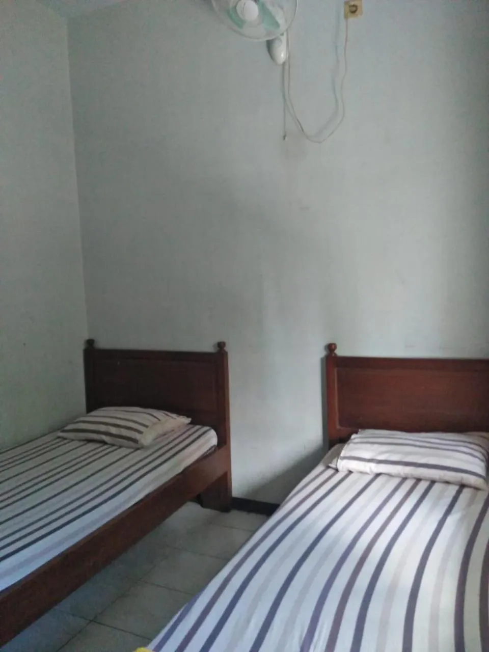 Bed in Penginapan Hotel Mangir Asri
