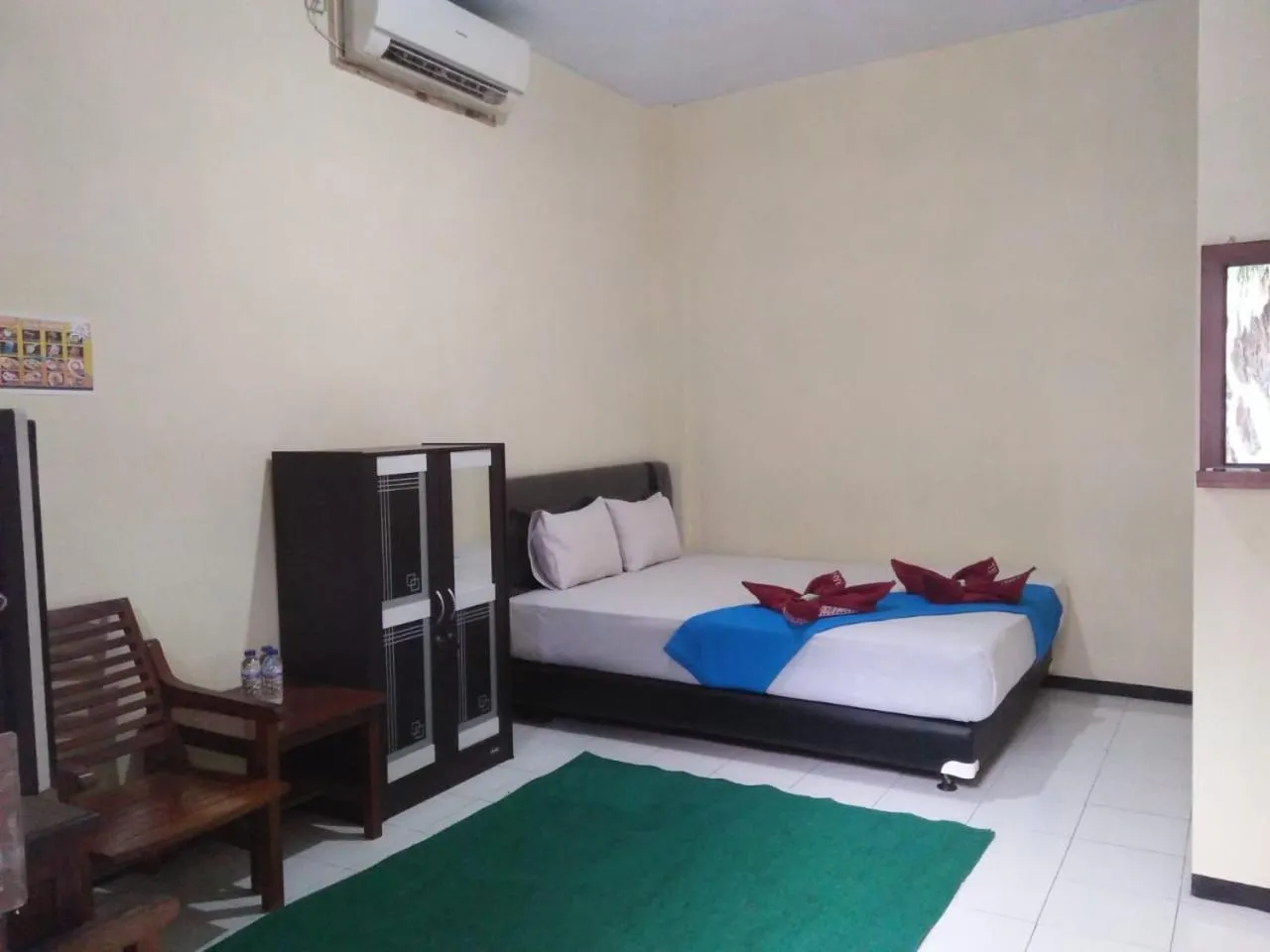 Bed in Penginapan Hotel Mangir Asri