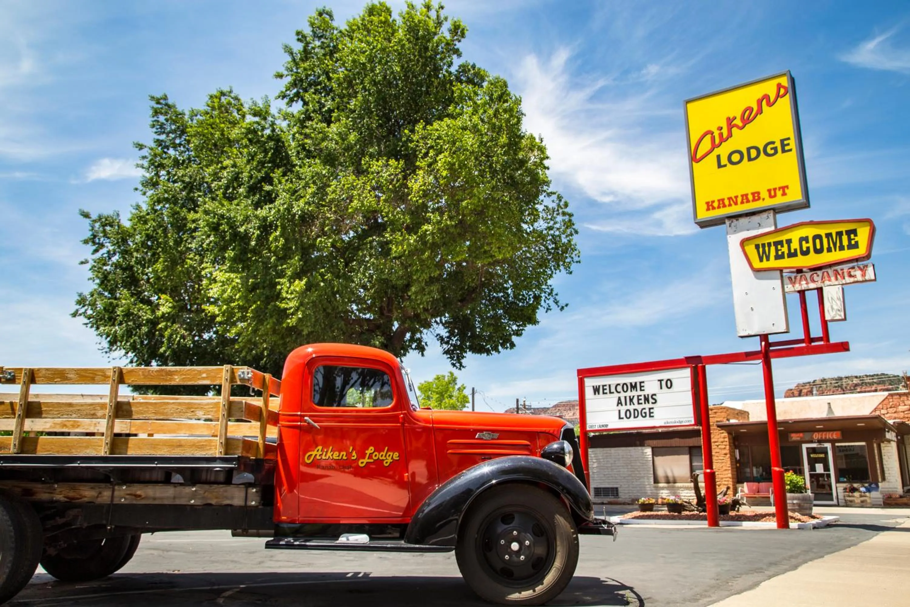 Property logo or sign in Aikens Lodge