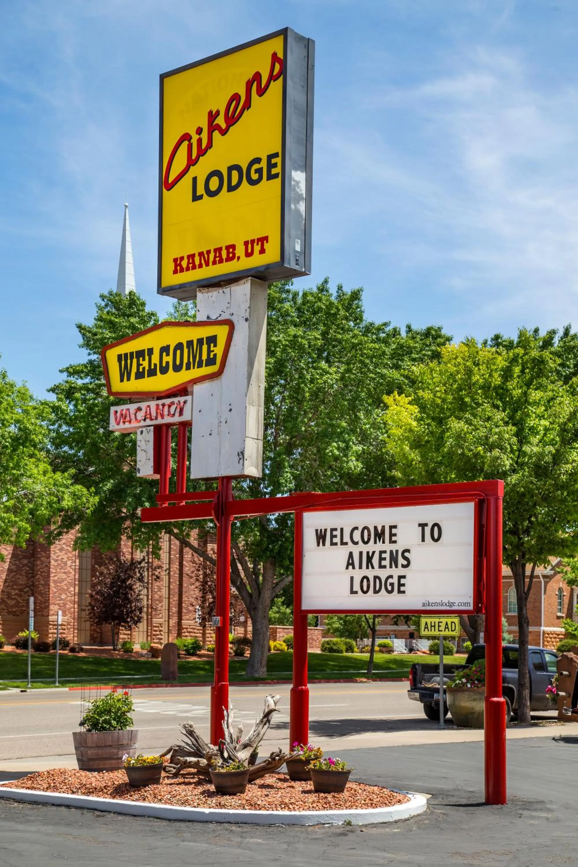 Property logo or sign in Aikens Lodge