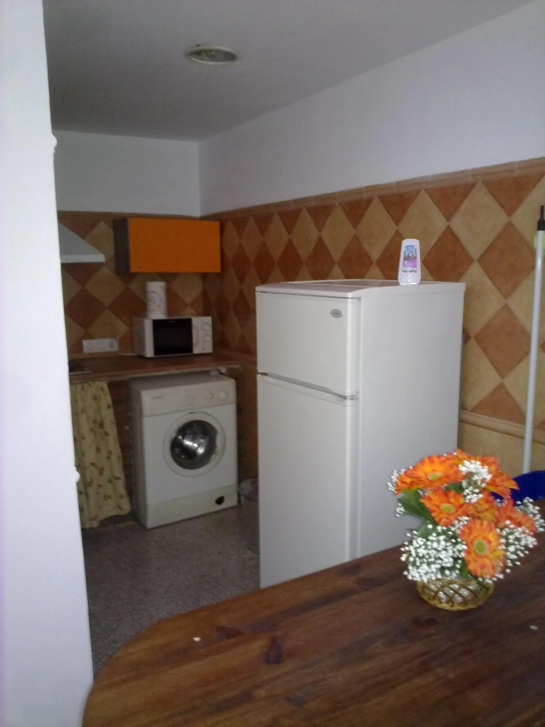 Kitchen or kitchenette in Hospedaje Lisboa Algeciras P Ca 0214 y A Ca 0232