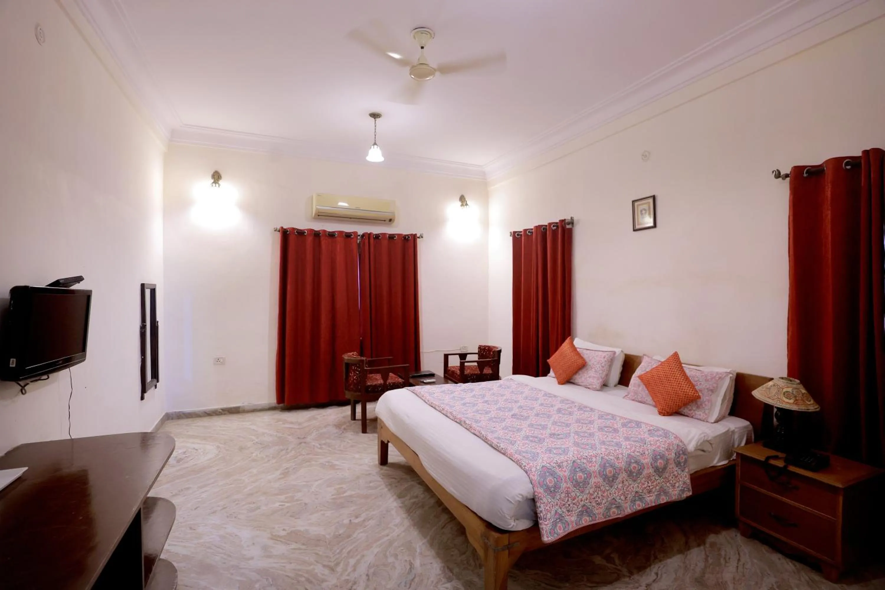 Bed in Satyam Palace Resort