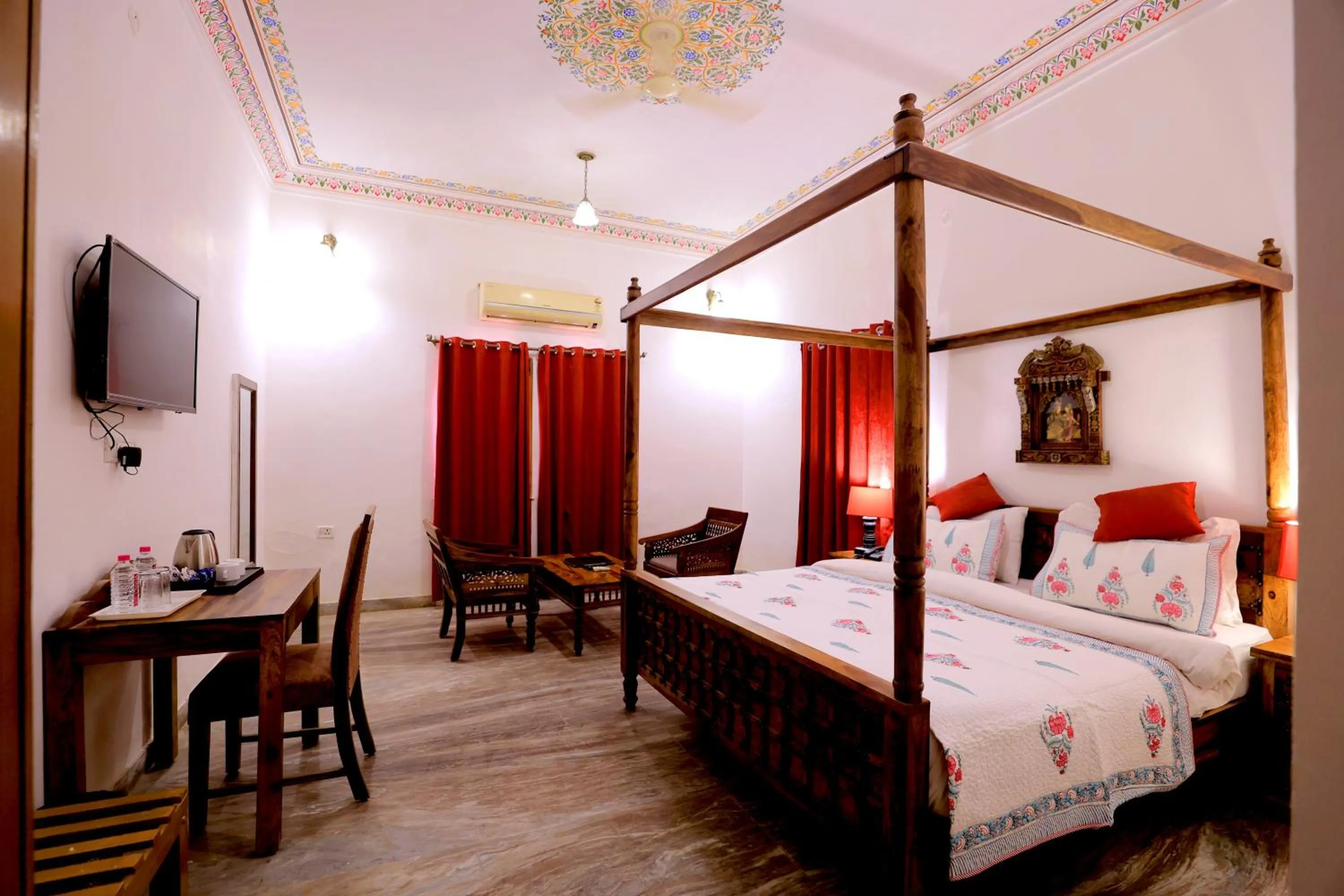 Bed in Satyam Palace Resort