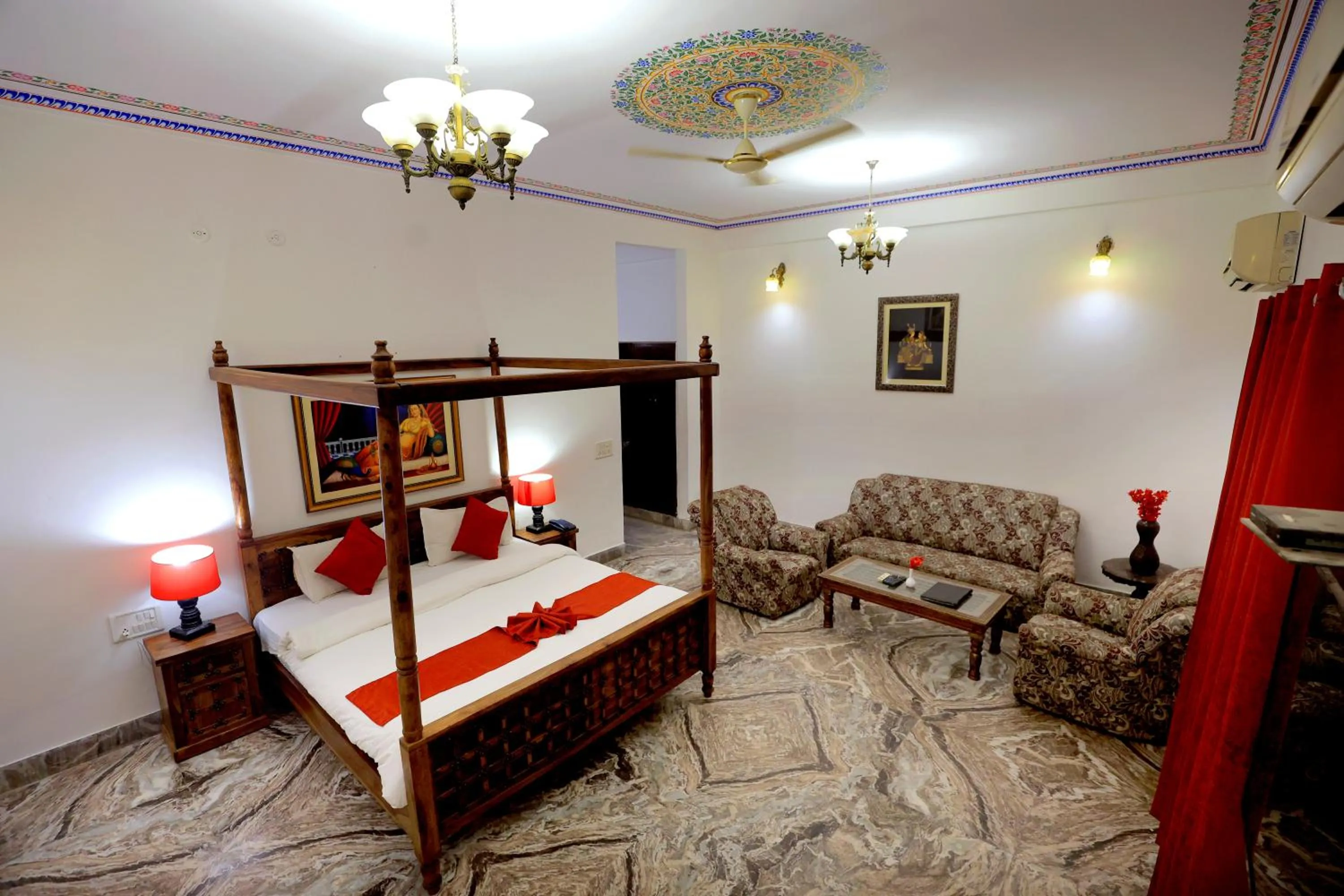 Bed in Satyam Palace Resort
