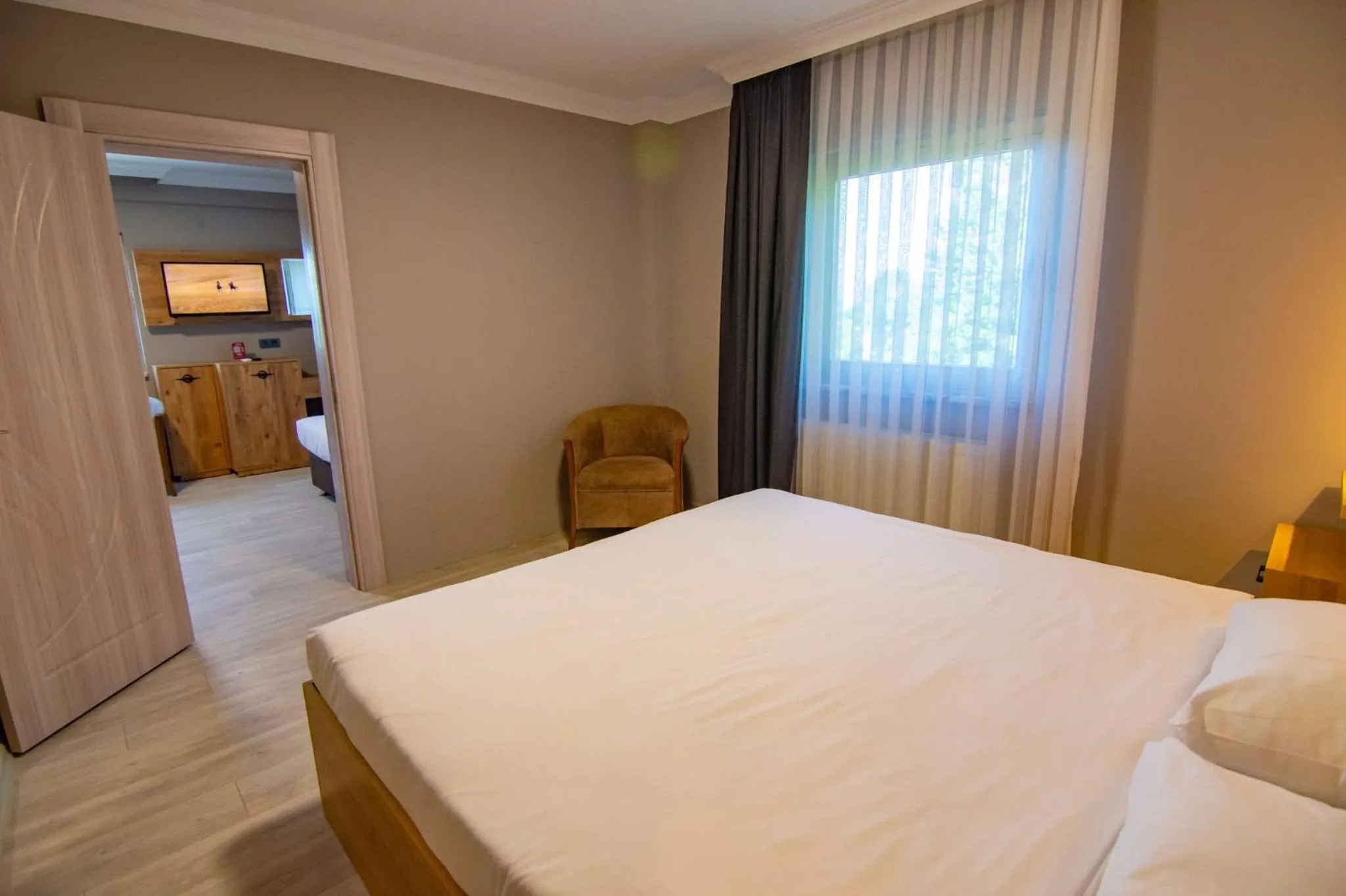 Bed in Green Palace Suite Hotel