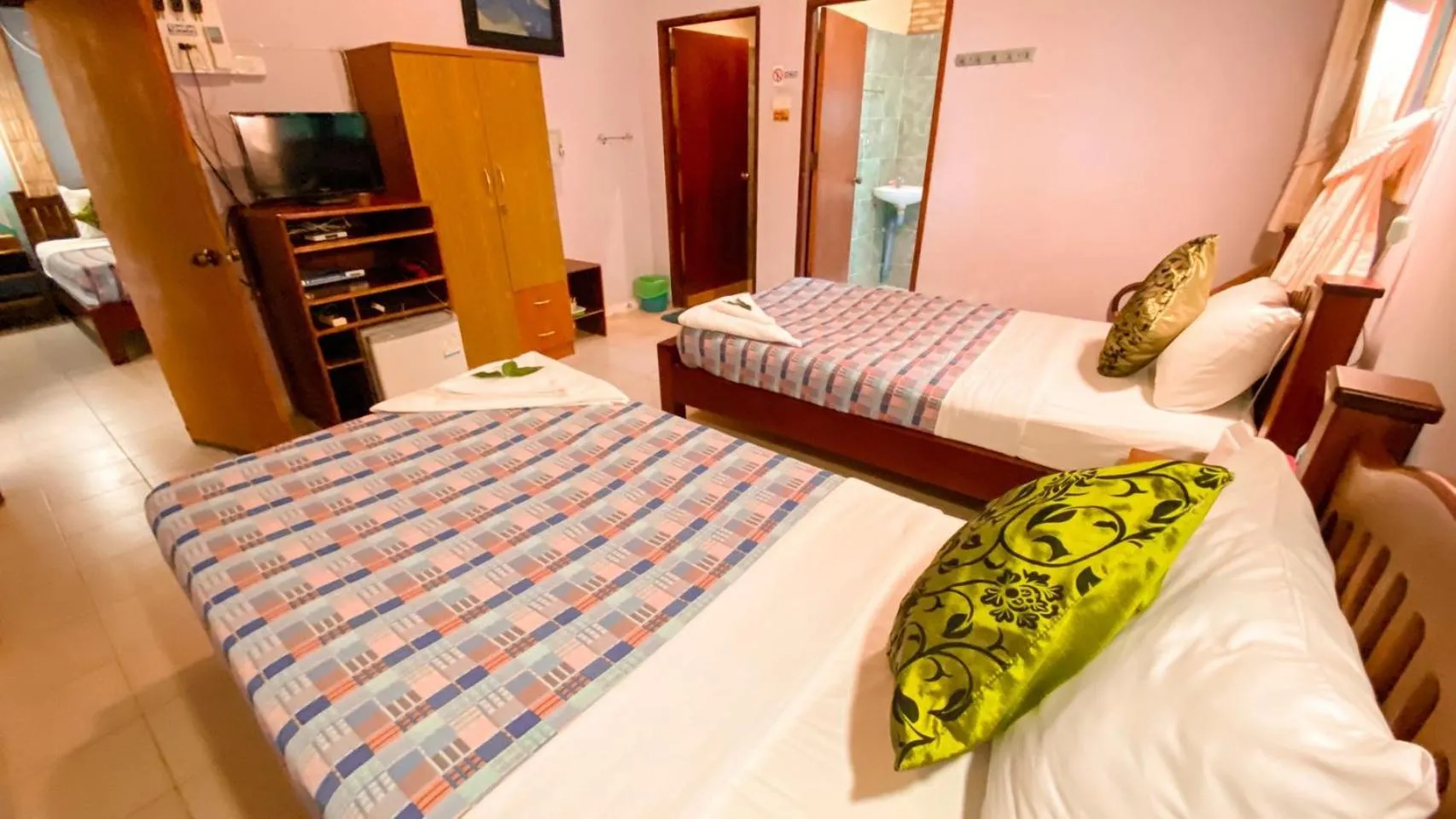 Bed in Faasai Resort & Spa