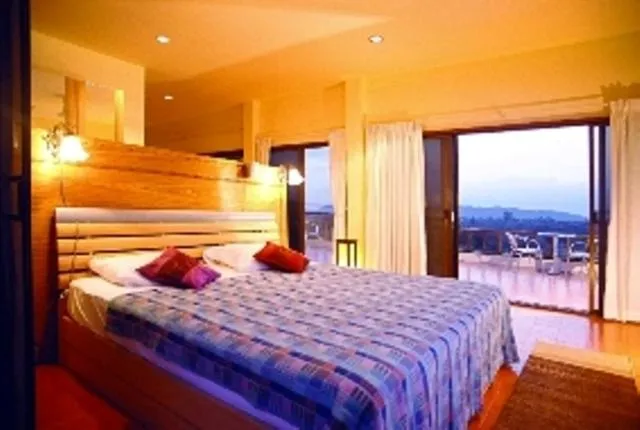 Bed in Faasai Resort & Spa