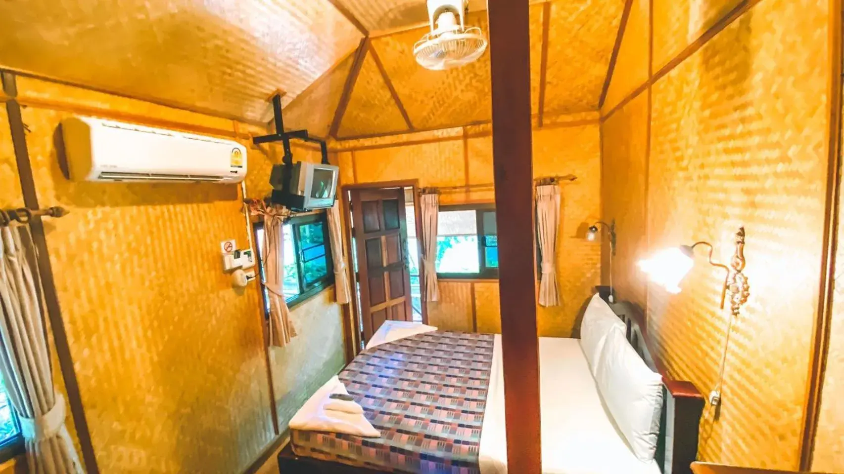 TV and multimedia, Bed in Faasai Resort & Spa TV and multimedia, Bed in Faasai Resort & Spa