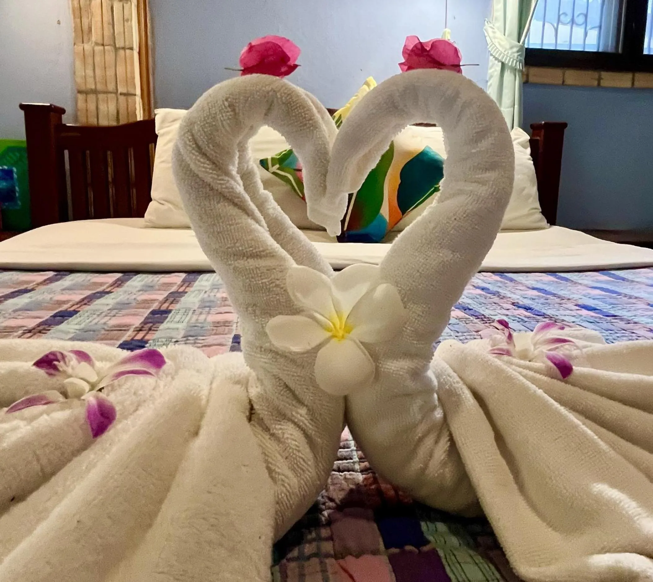 Bed in Faasai Resort & Spa