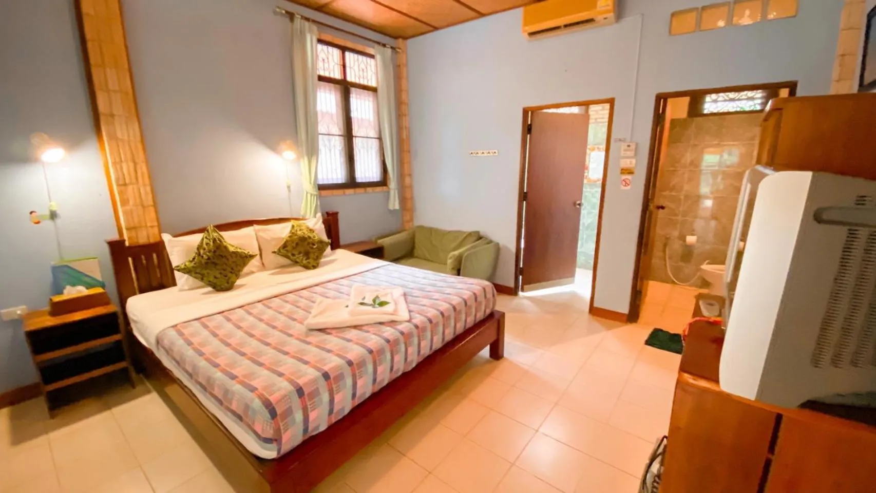 Bed in Faasai Resort & Spa