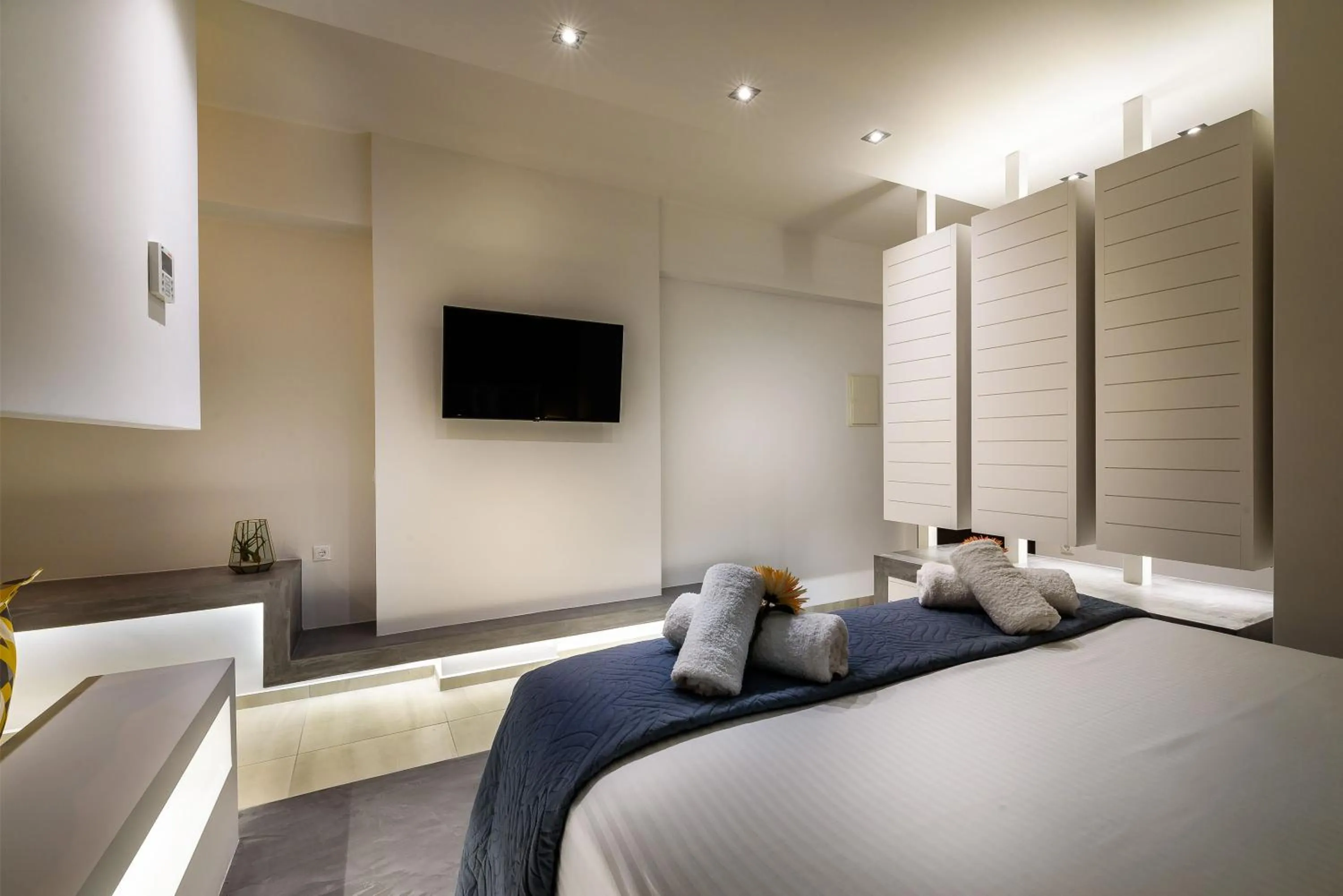 Bed in Solar Apartments by Amara Living