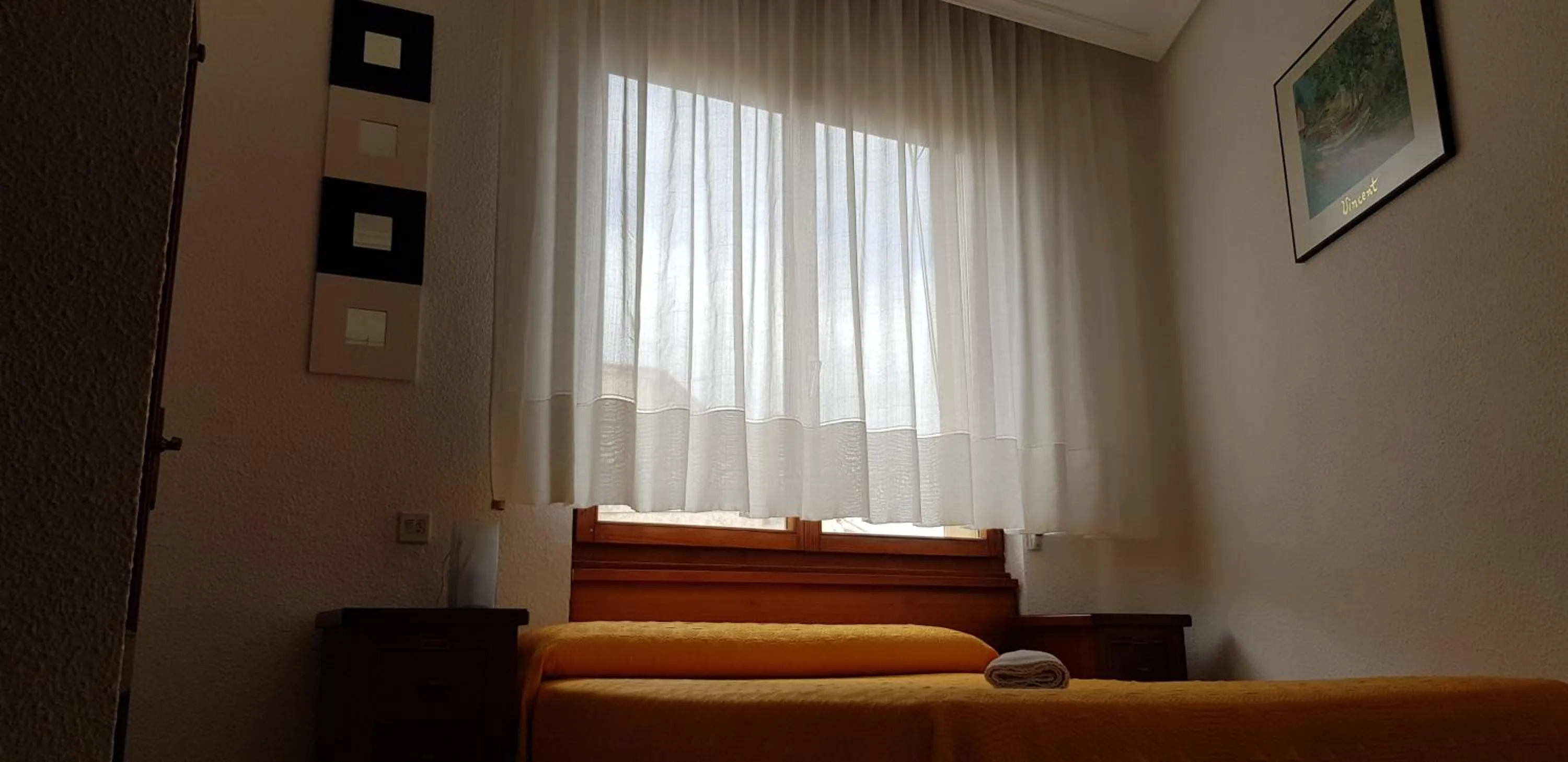 Bed in Pension Salamanca