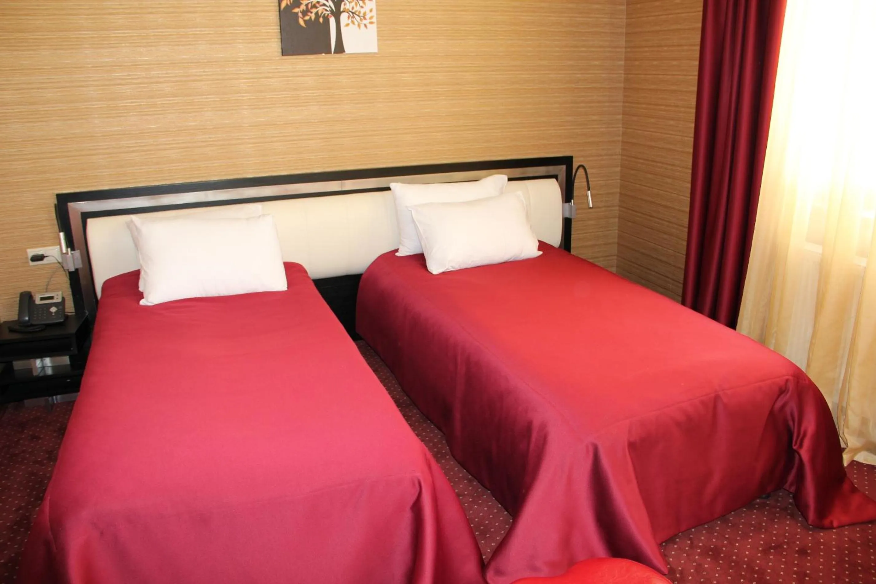 Bed in Hotel Villa Palace