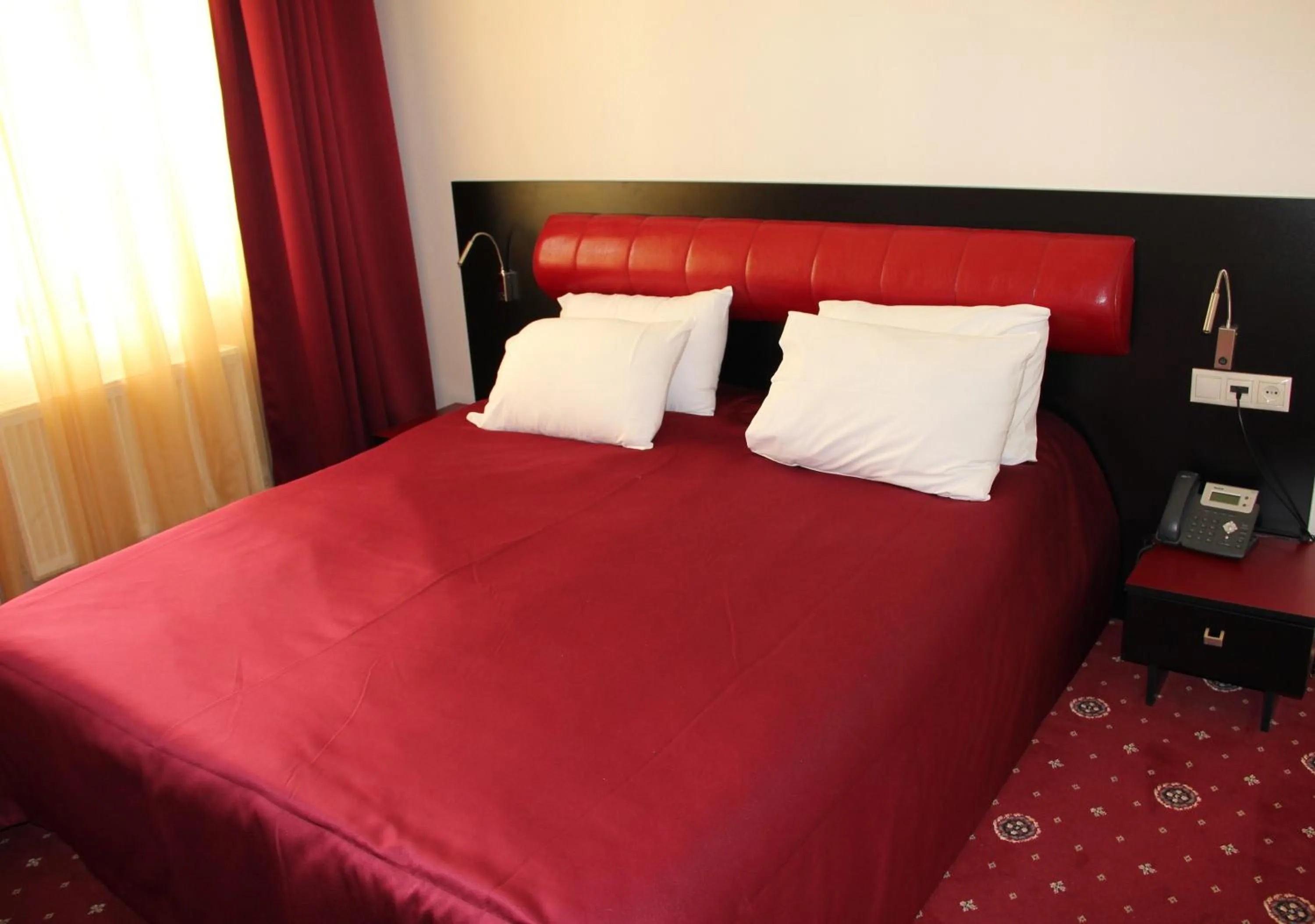 Bed in Hotel Villa Palace