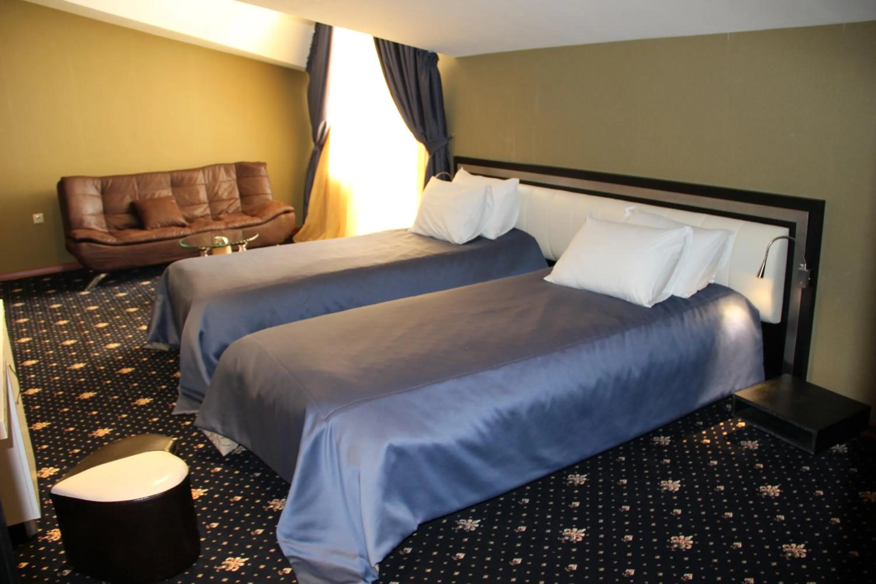 Bed in Hotel Villa Palace