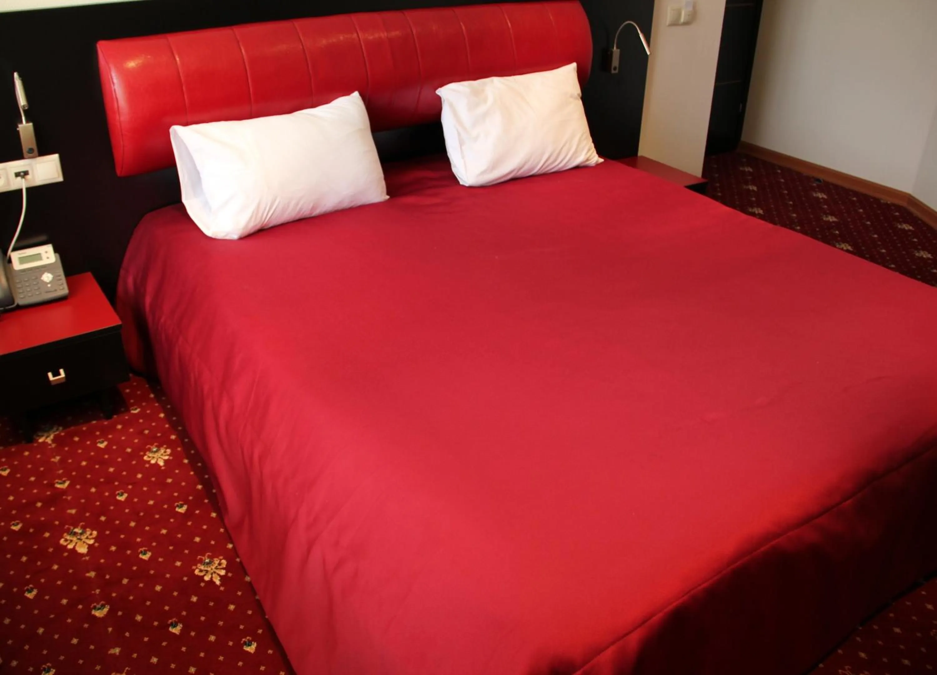 Bed in Hotel Villa Palace