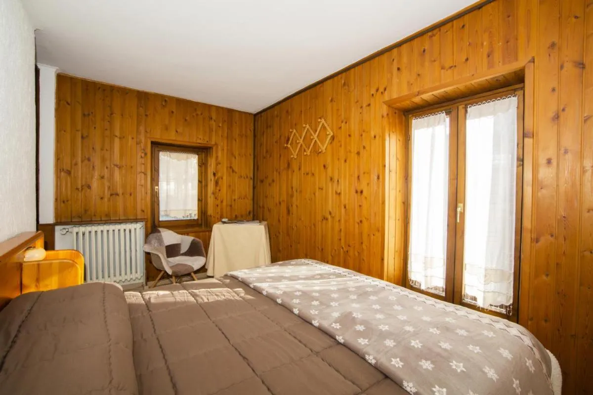 Bed in Hotel Chalet Joli
