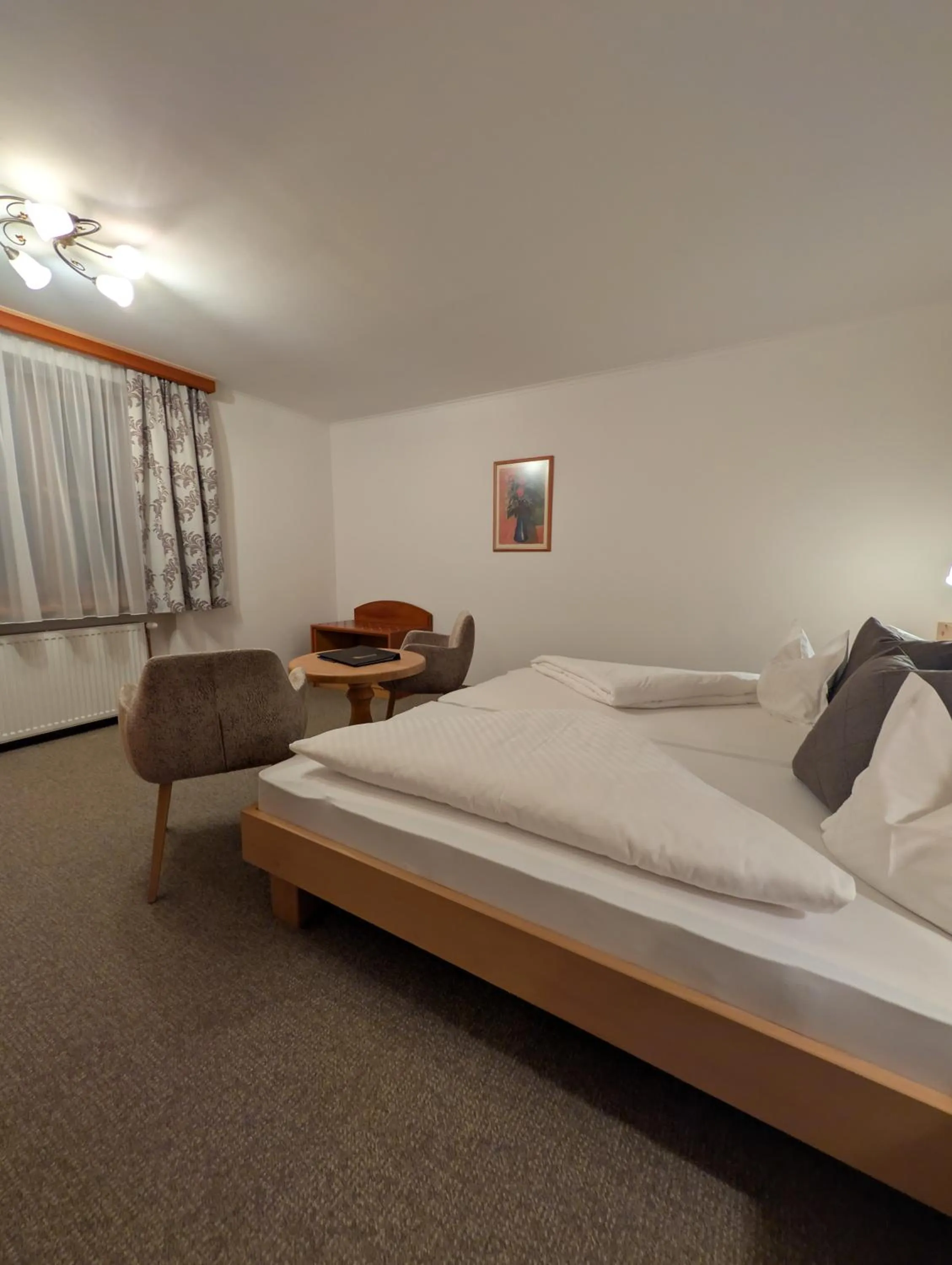 Photo of the whole room, Bed in Hotel Krimmlerfälle