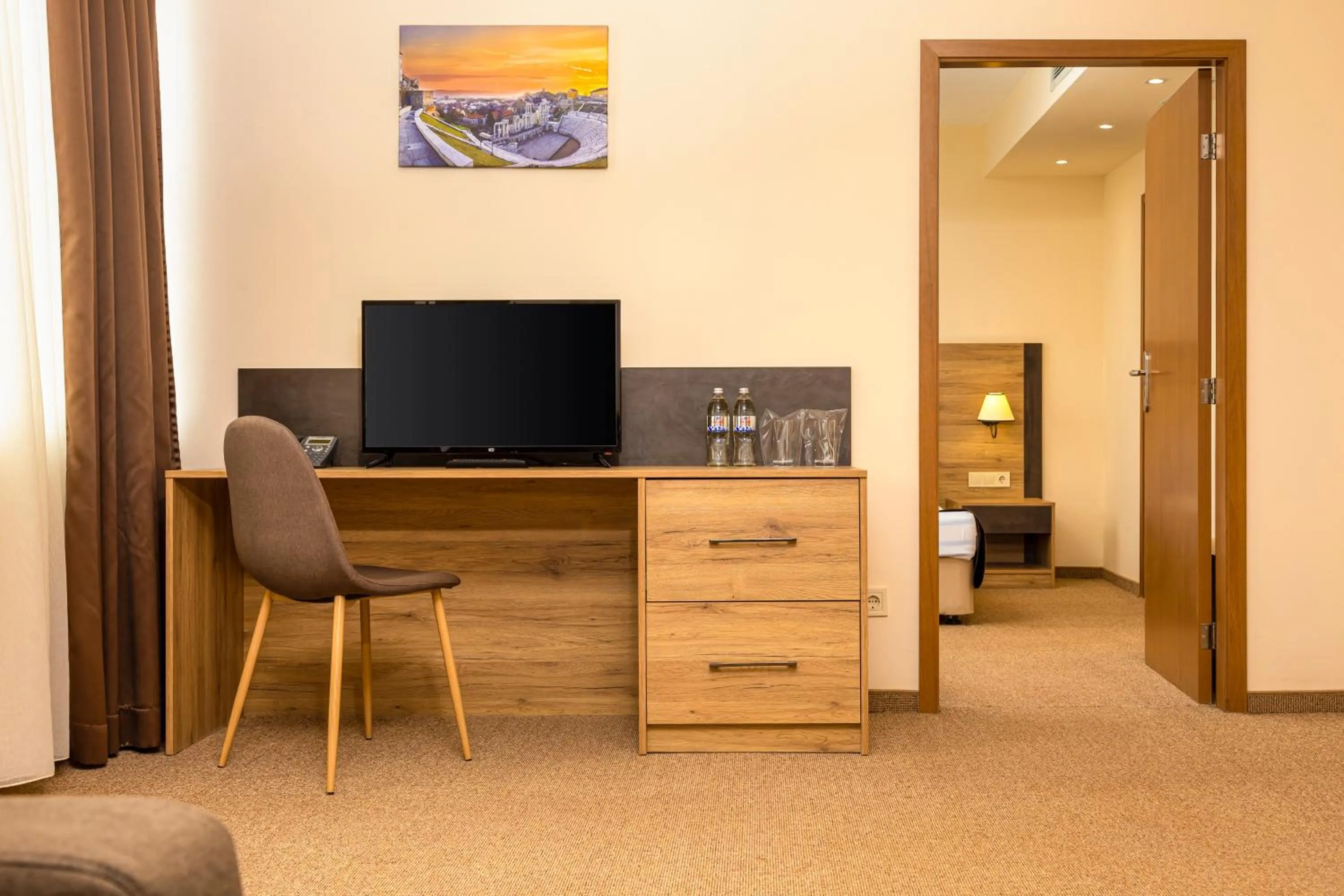 Communal lounge/ TV room in Hotel Intelcoop