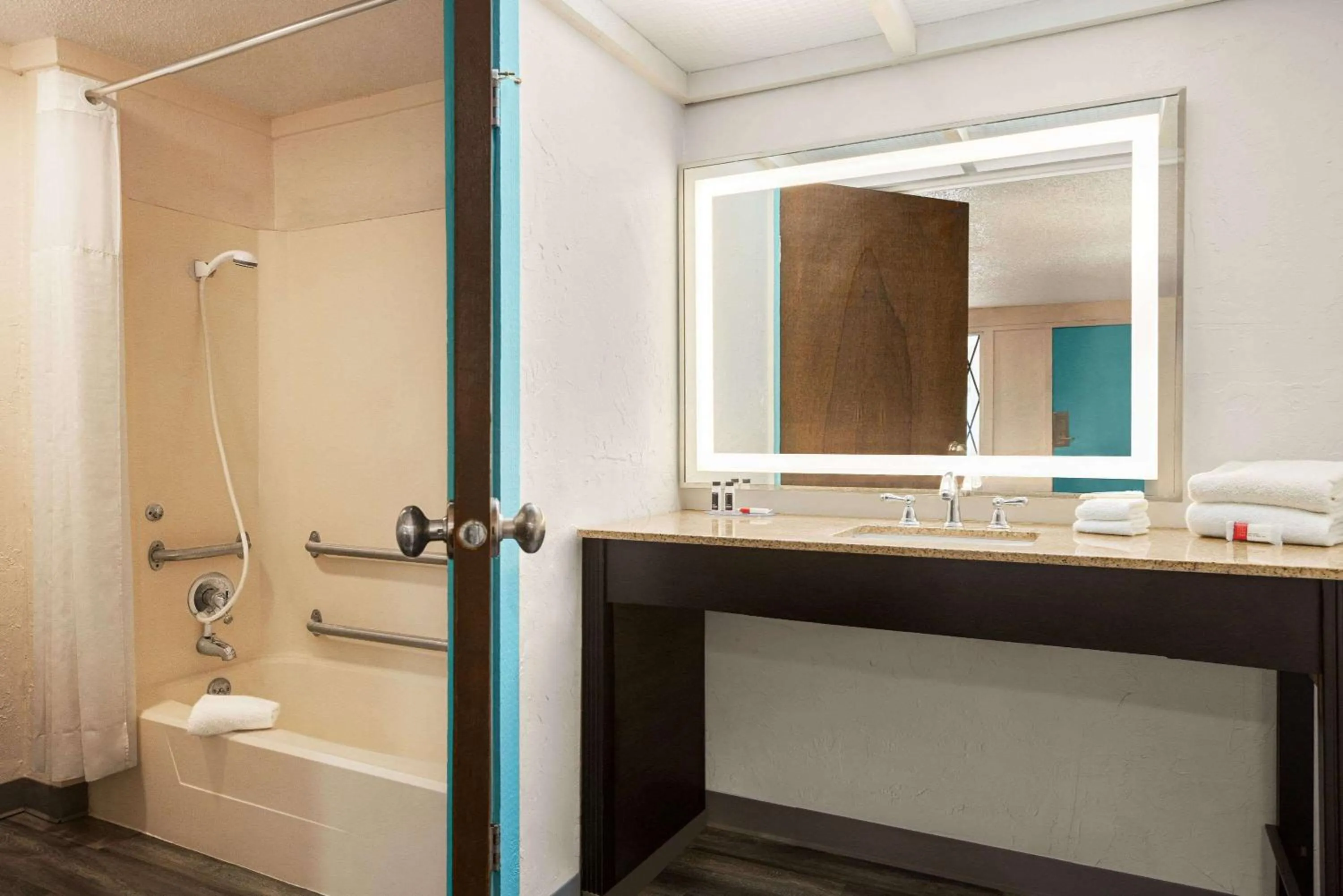 Bathroom in Dover Inn and Suites