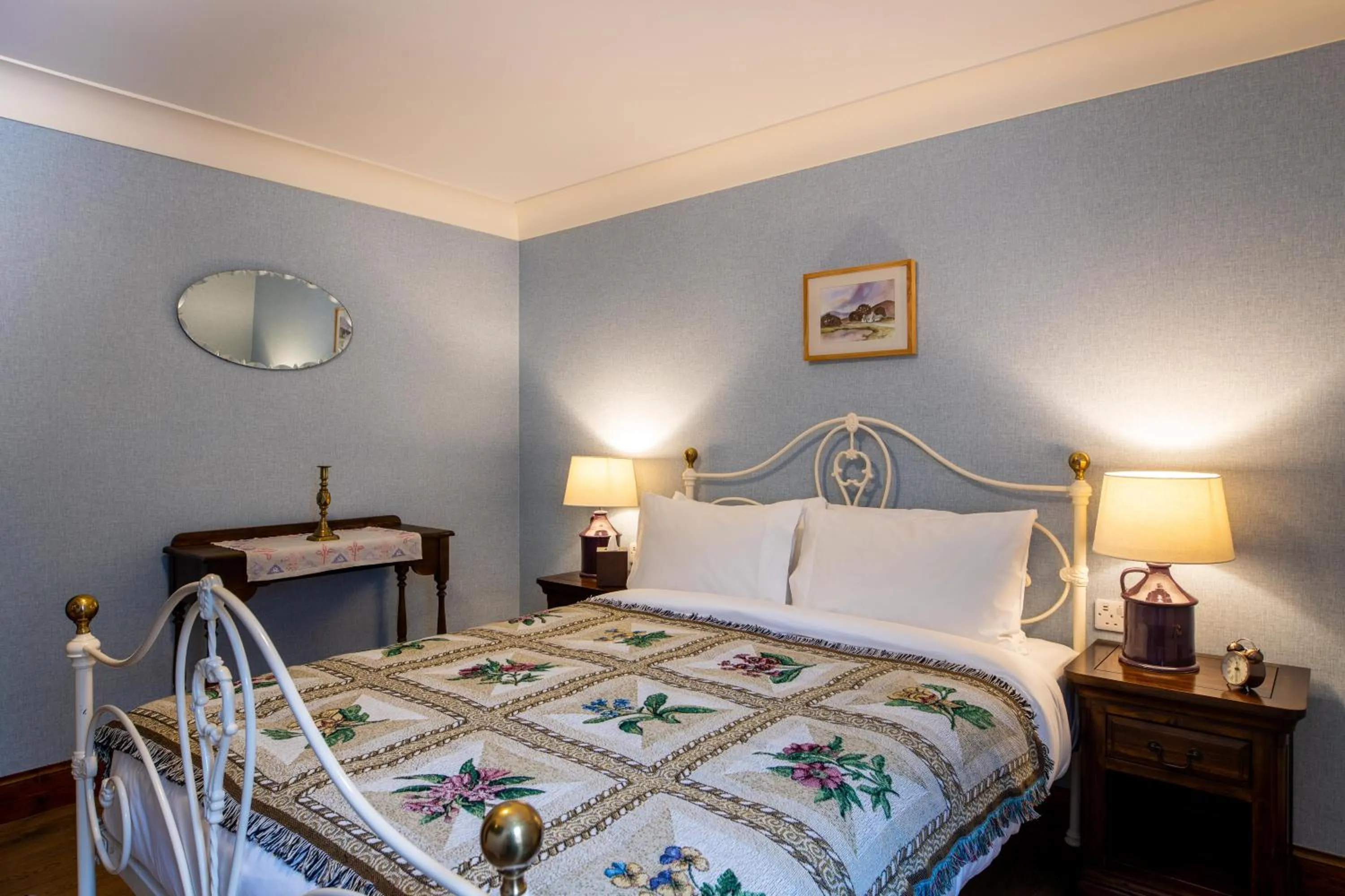 Bed in The Whispering Pine Lodge