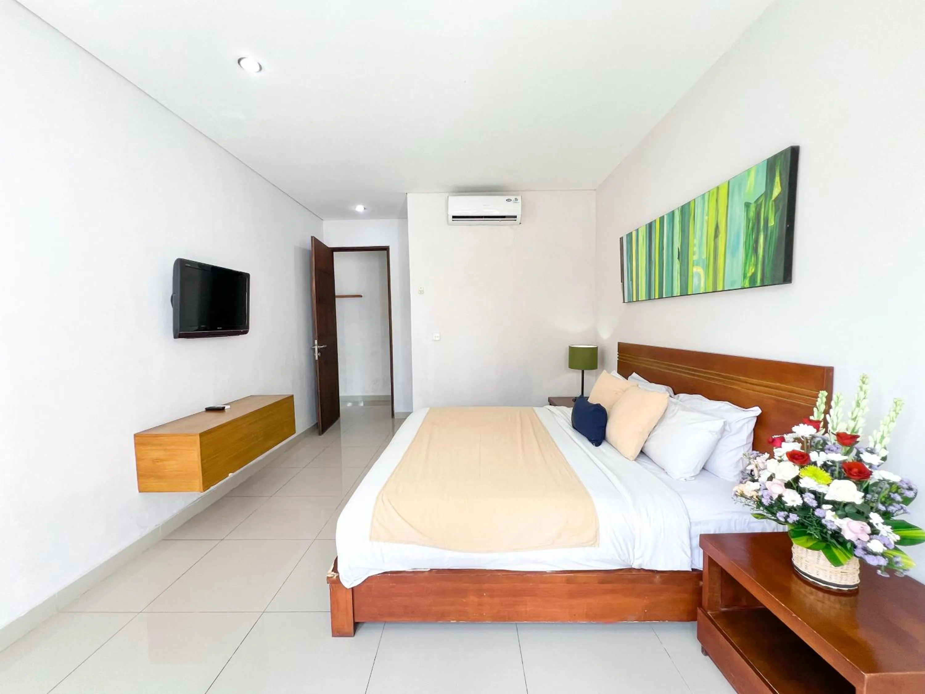 Bed in Apple Villas & Apartments