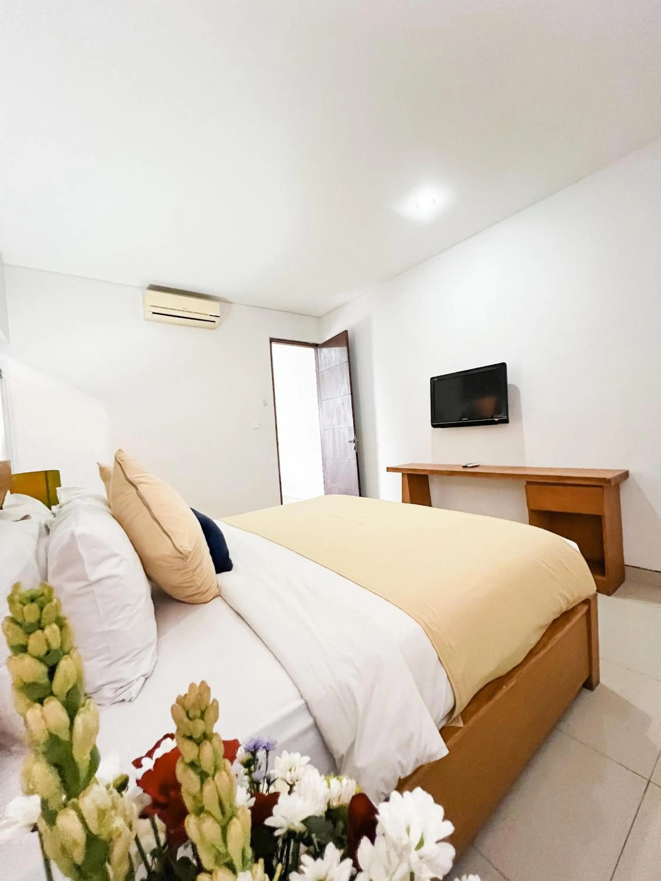 Bed in Apple Villas & Apartments